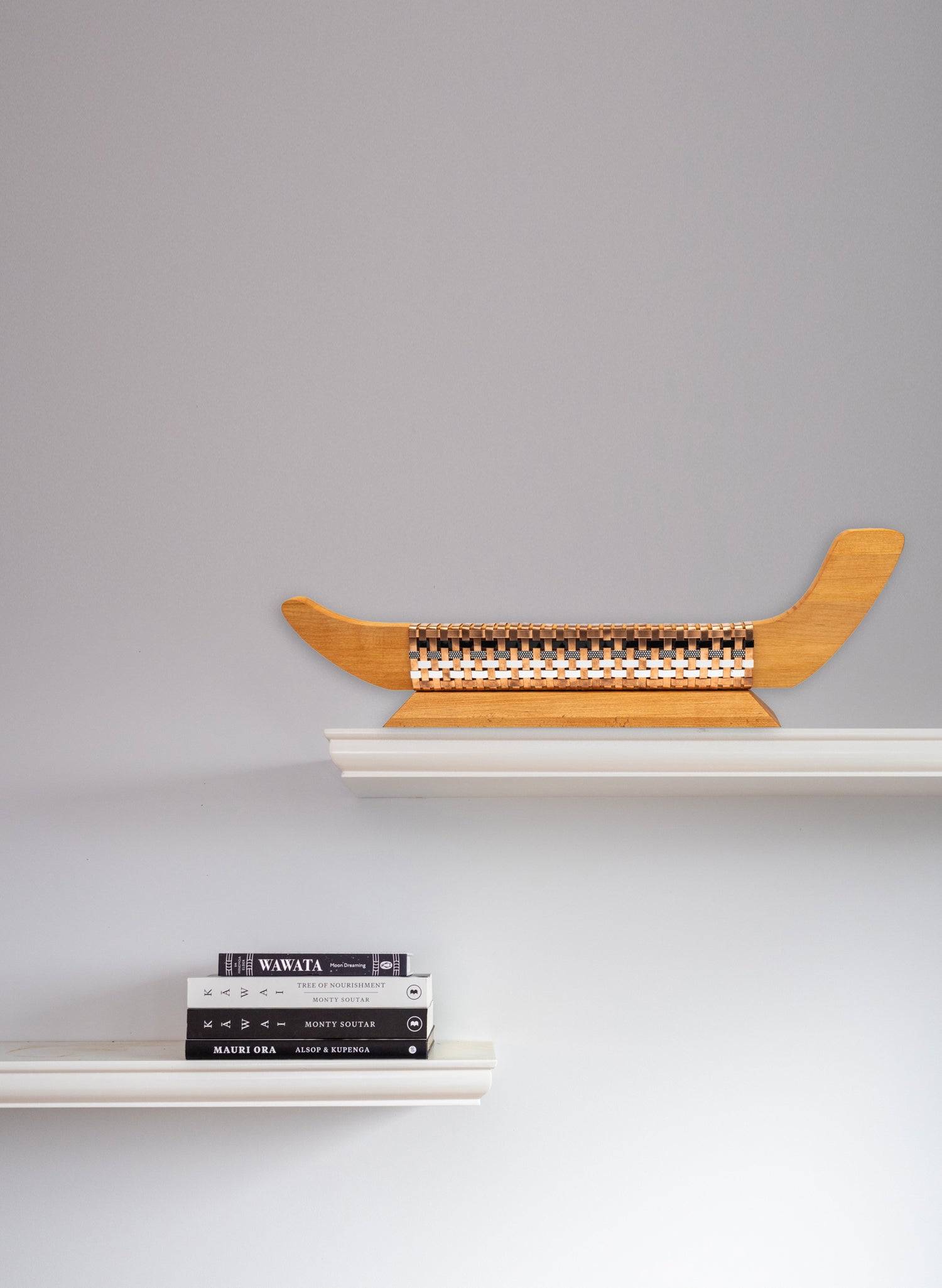 Black, White and Silver Waka on Plinth