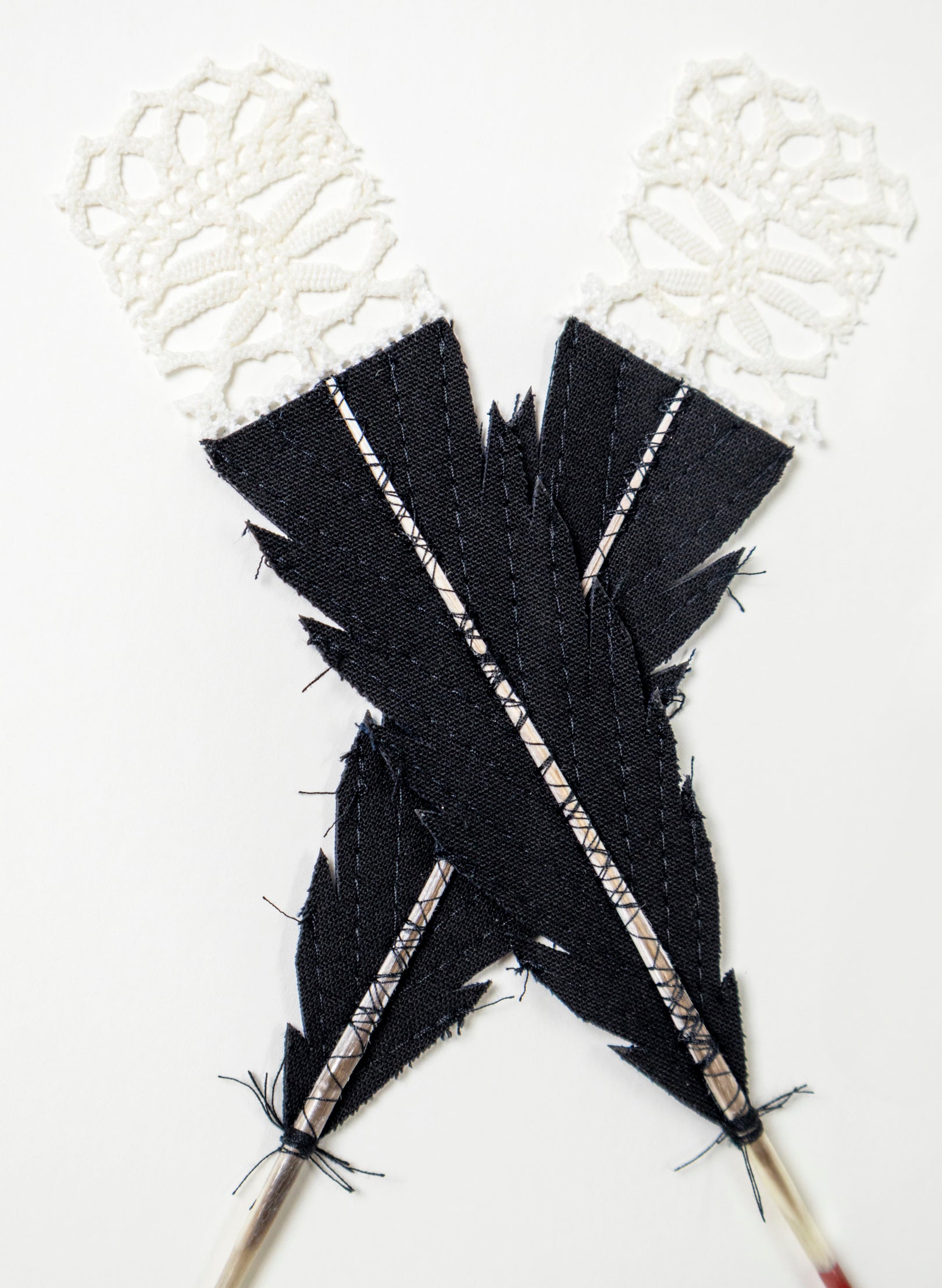 Single X Huia Feathers