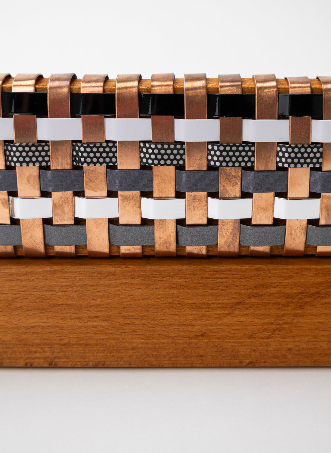 Black, White, Silver and Copper Waka on Plinth