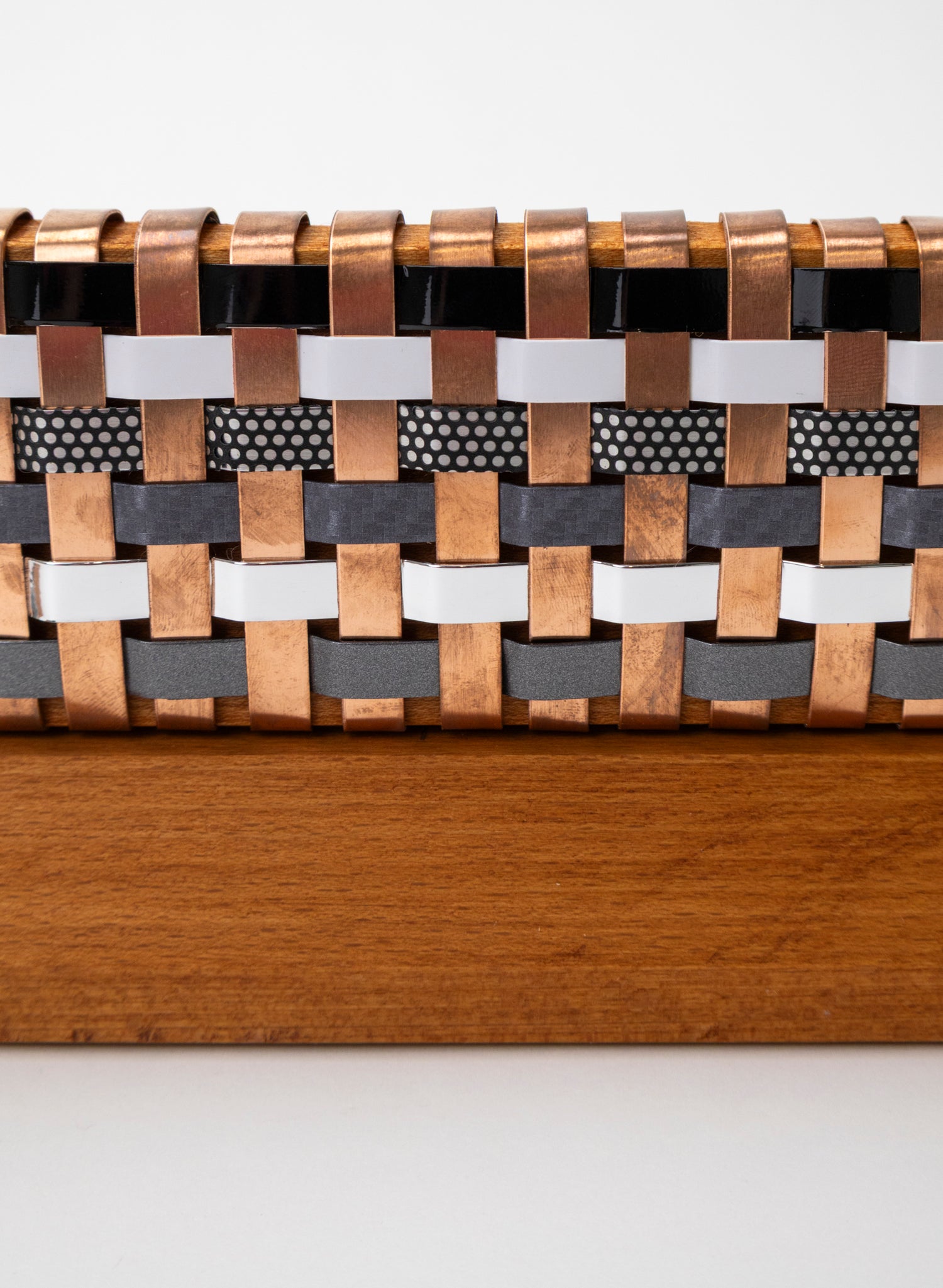 Black, White, Silver and Copper Waka on Plinth