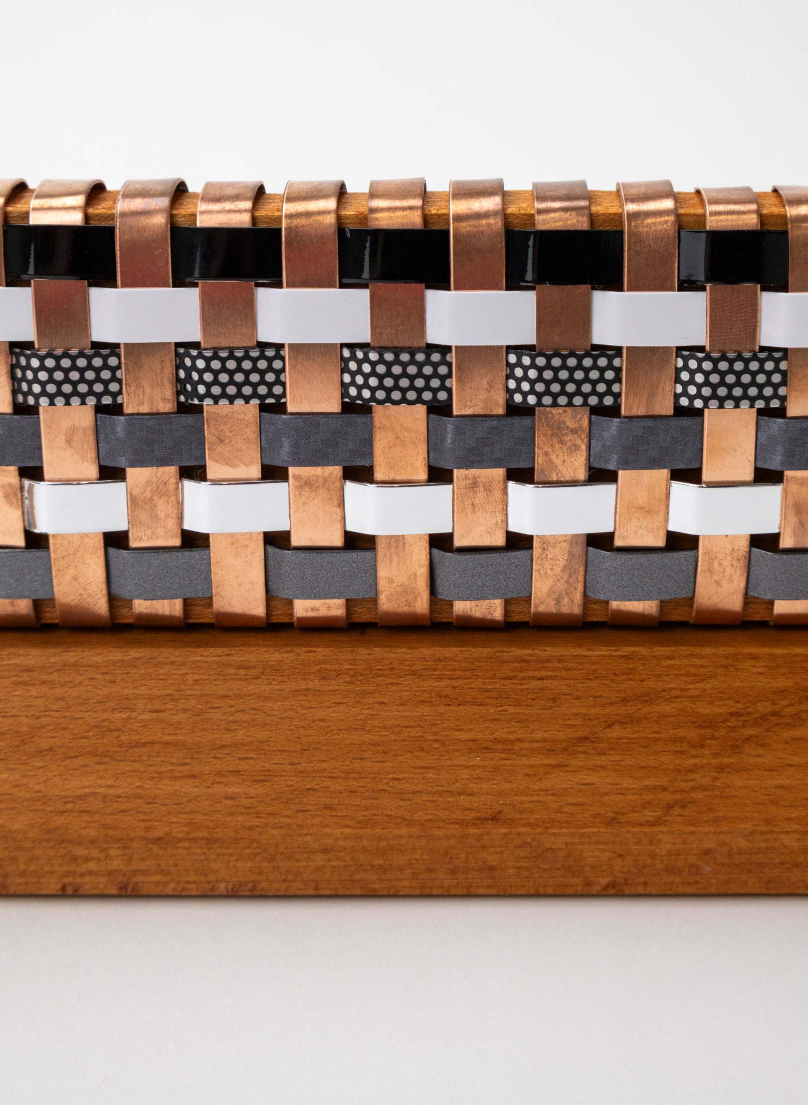 Black, White, Silver and Copper Waka on Plinth