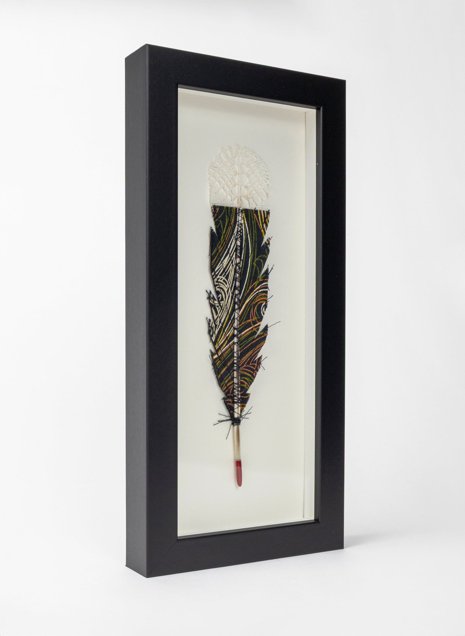 Single Huia Feather Framed