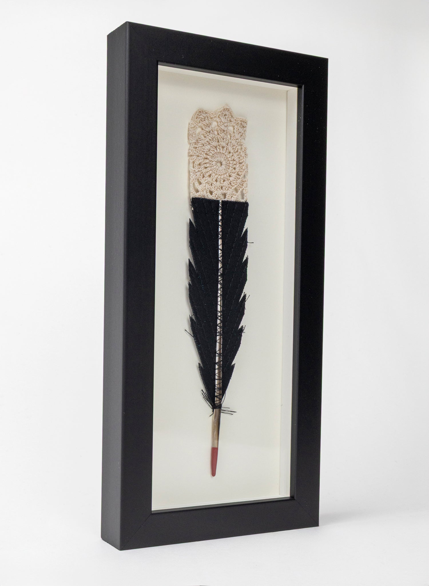 Single Huia Feather Framed