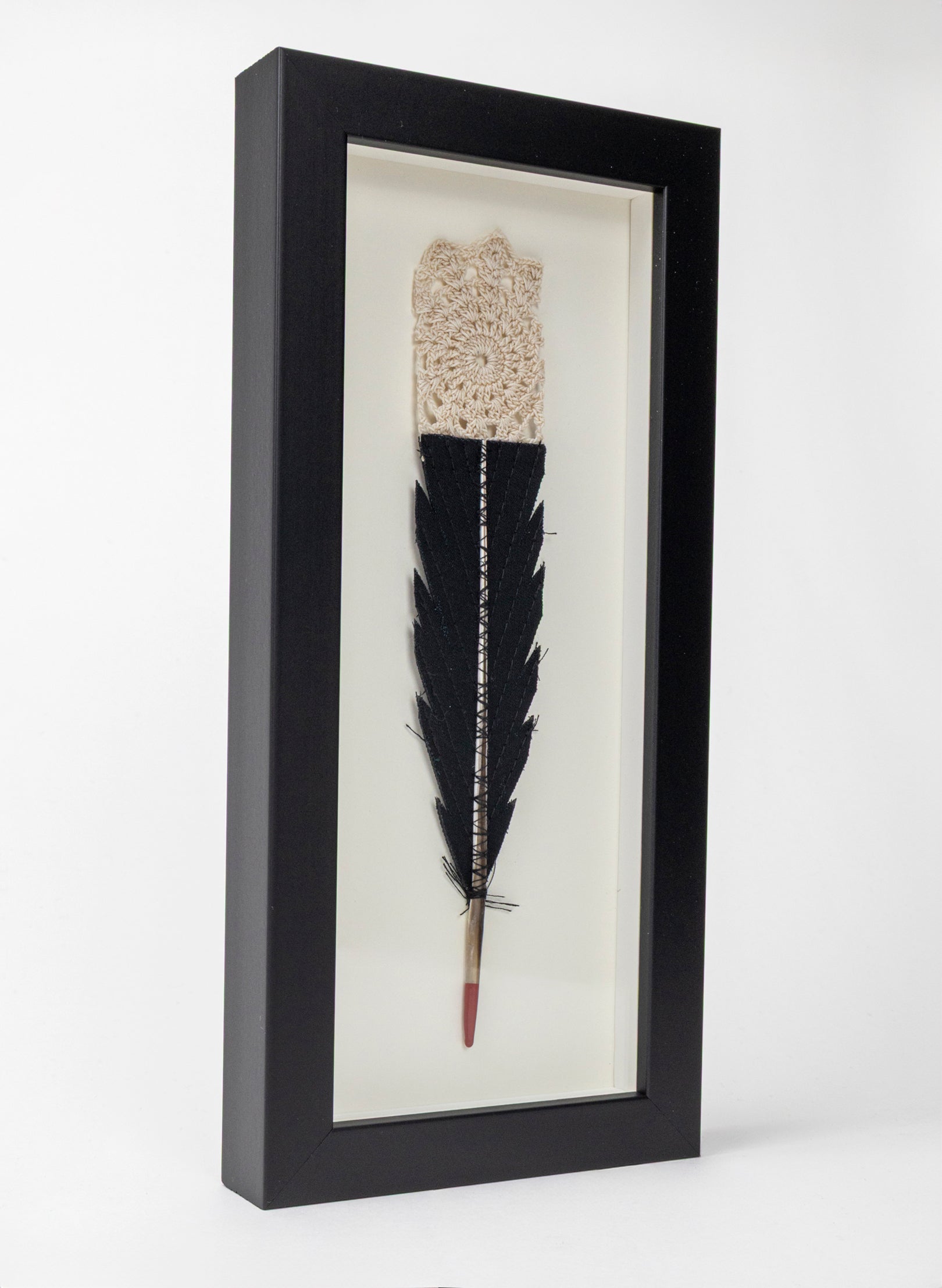 Single Huia Feather Framed