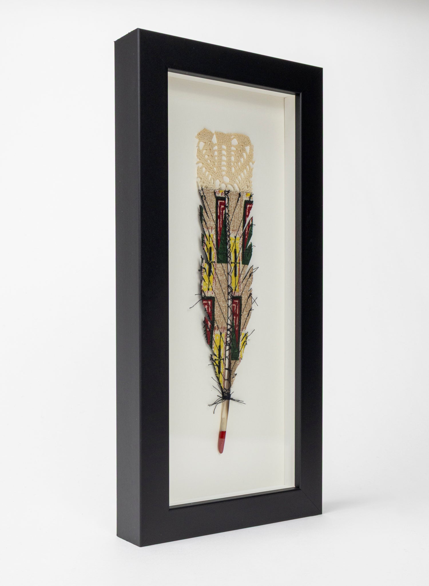 Single Huia Feather Framed