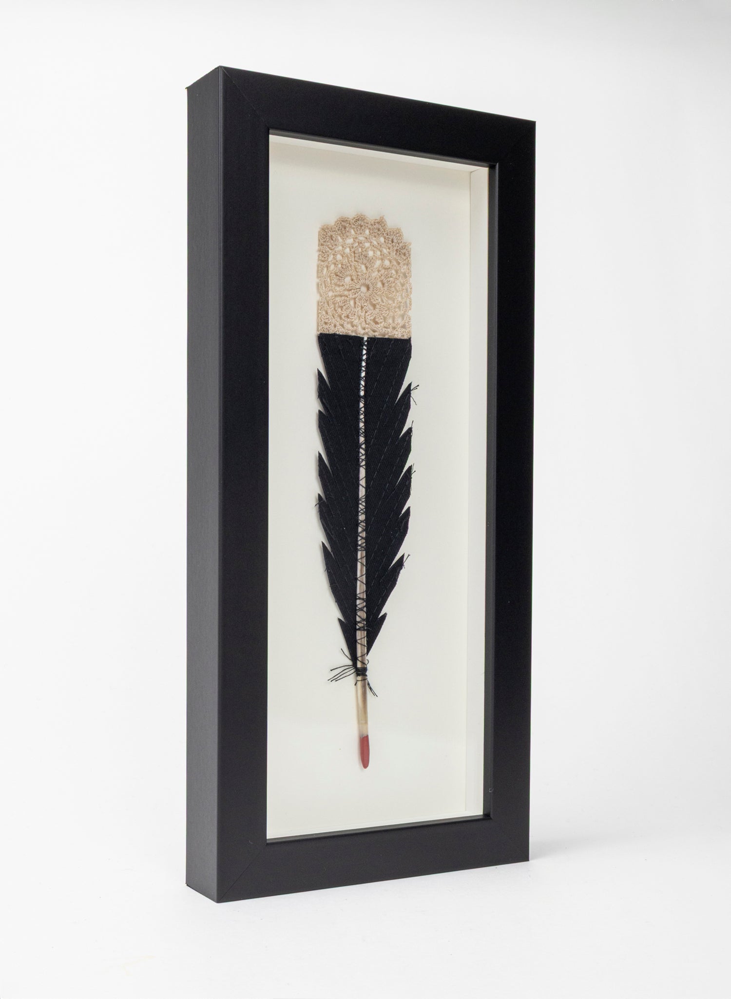 Single Huia Feather Framed
