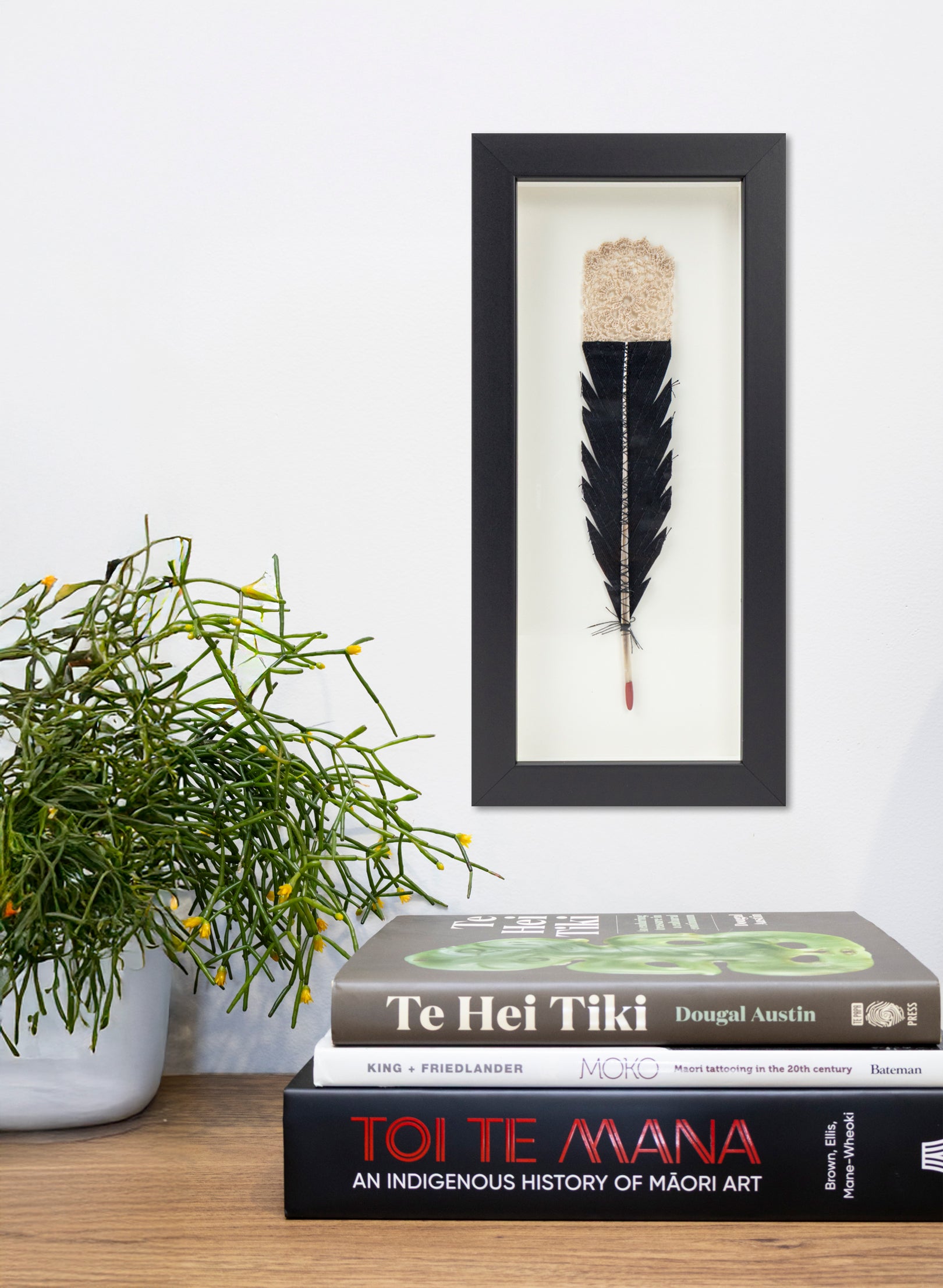 Single Huia Feather Framed