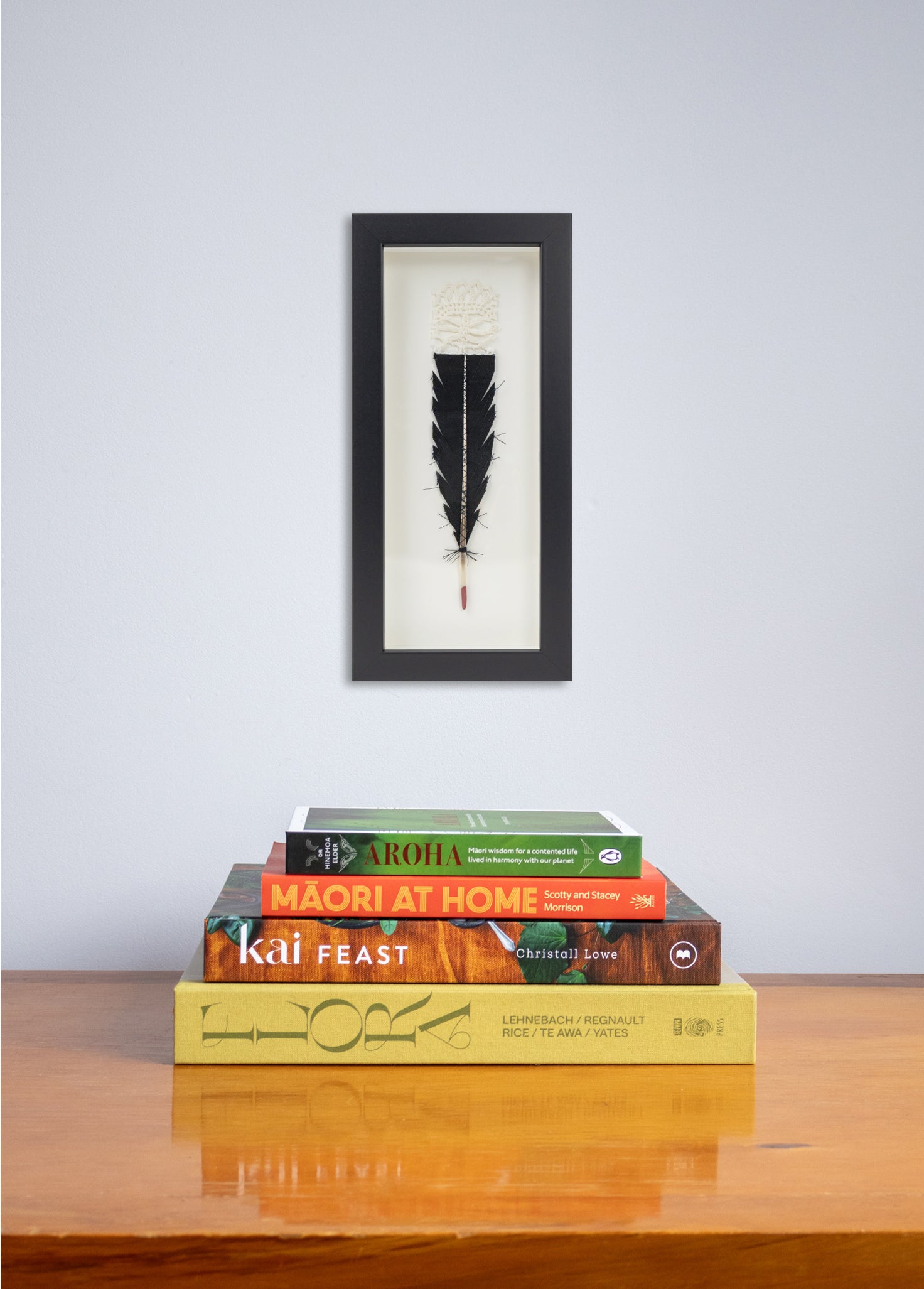 Single Huia Feather Framed