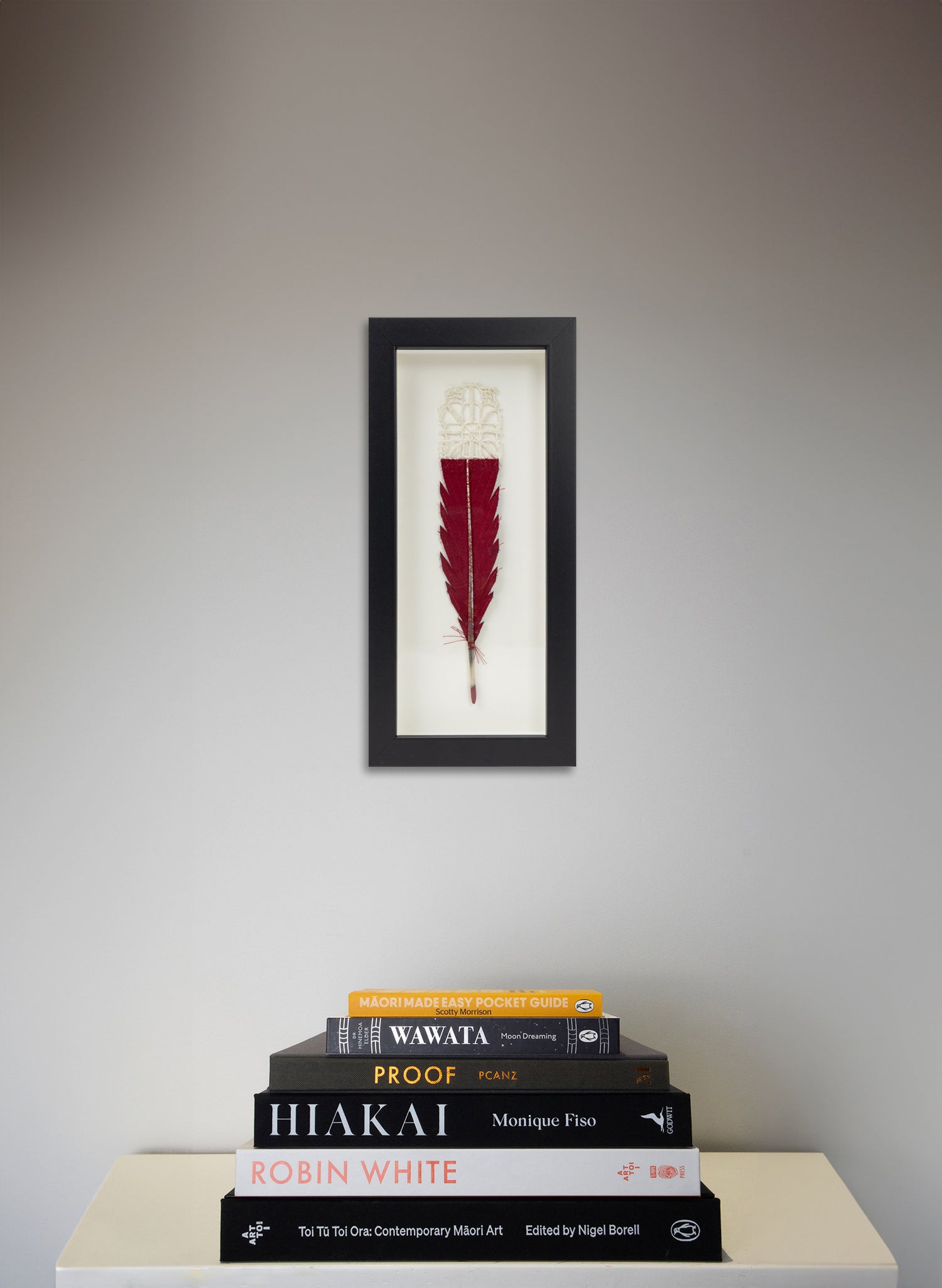 Single Huia Feather Framed