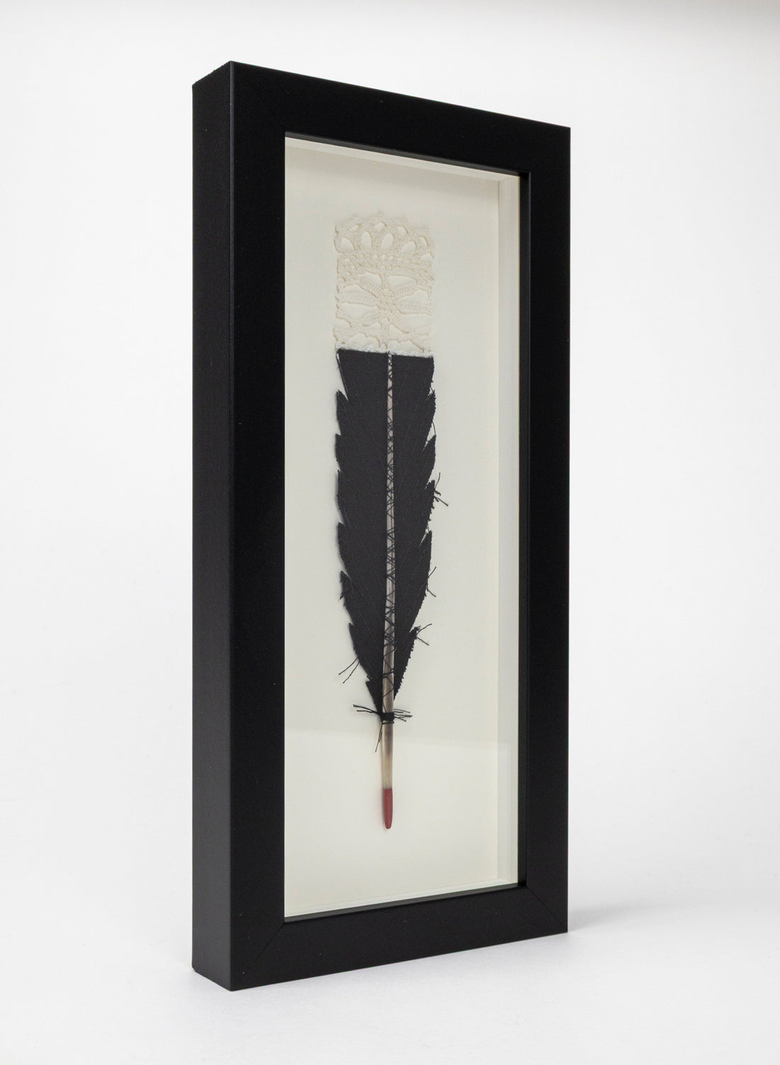 Single Huia Feather Framed