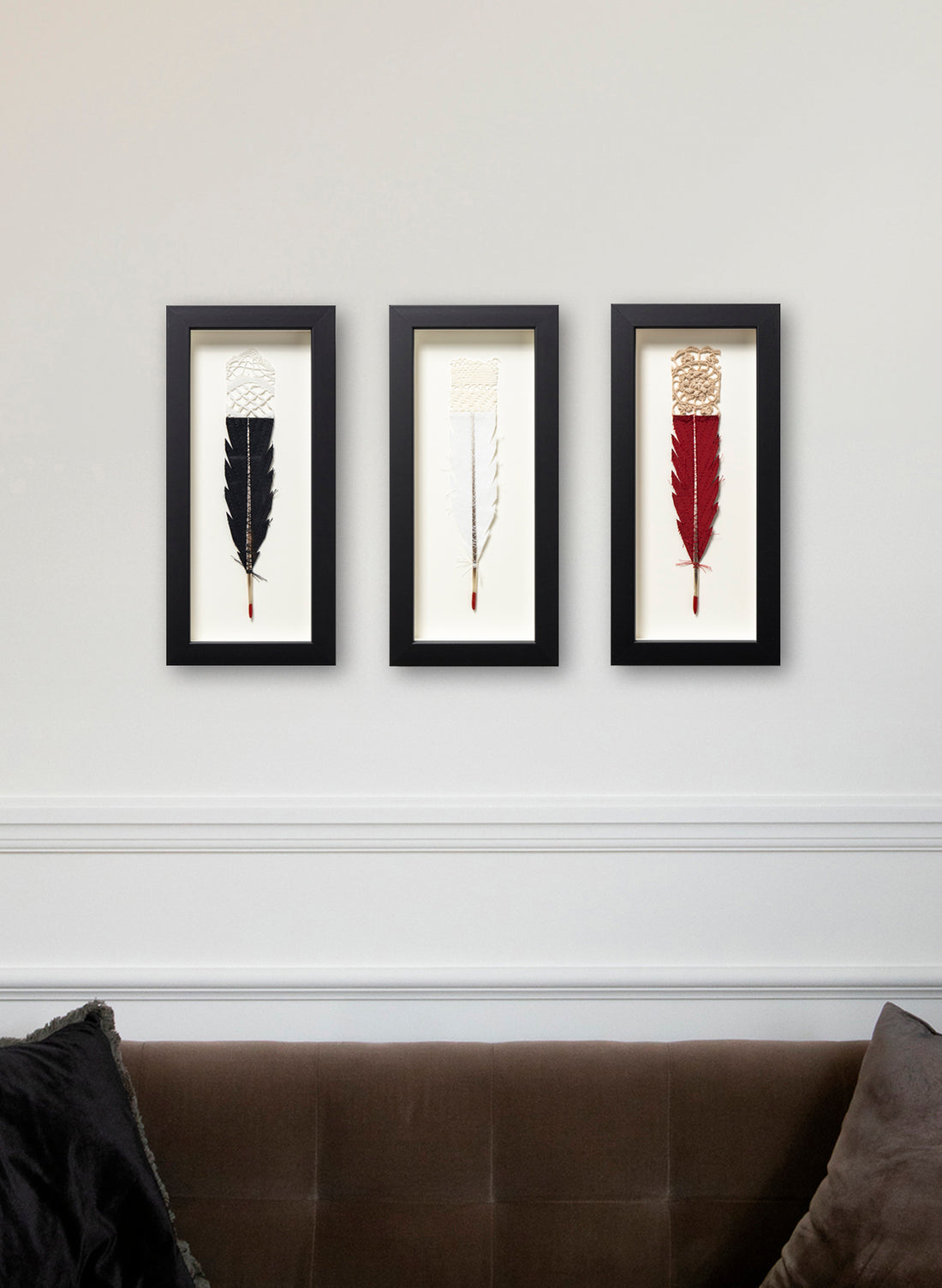 Single Huia Feather Framed