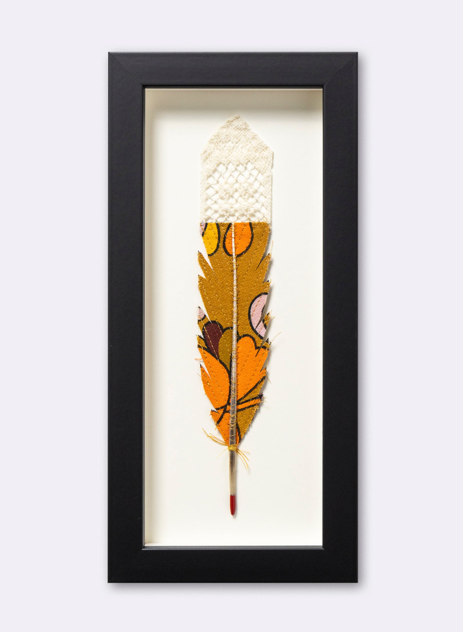 Single Huia Feather Framed