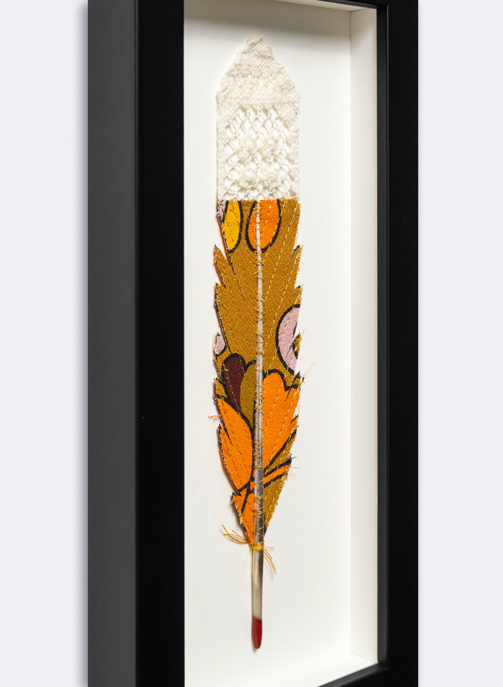 Single Huia Feather Framed