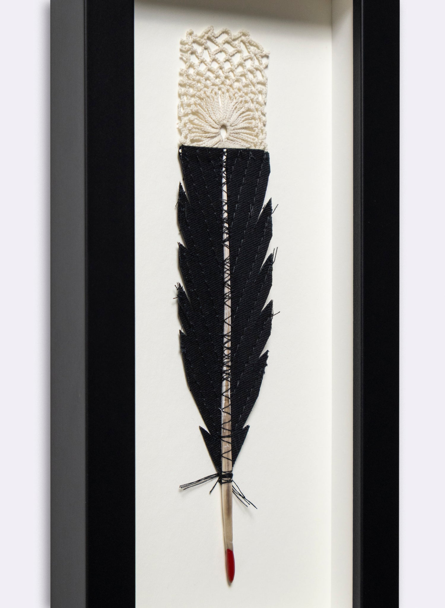 Single Huia Feather Framed
