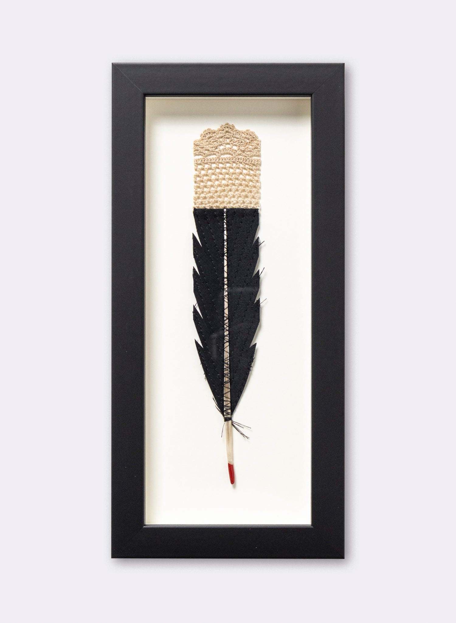 Single Huia Feather Framed