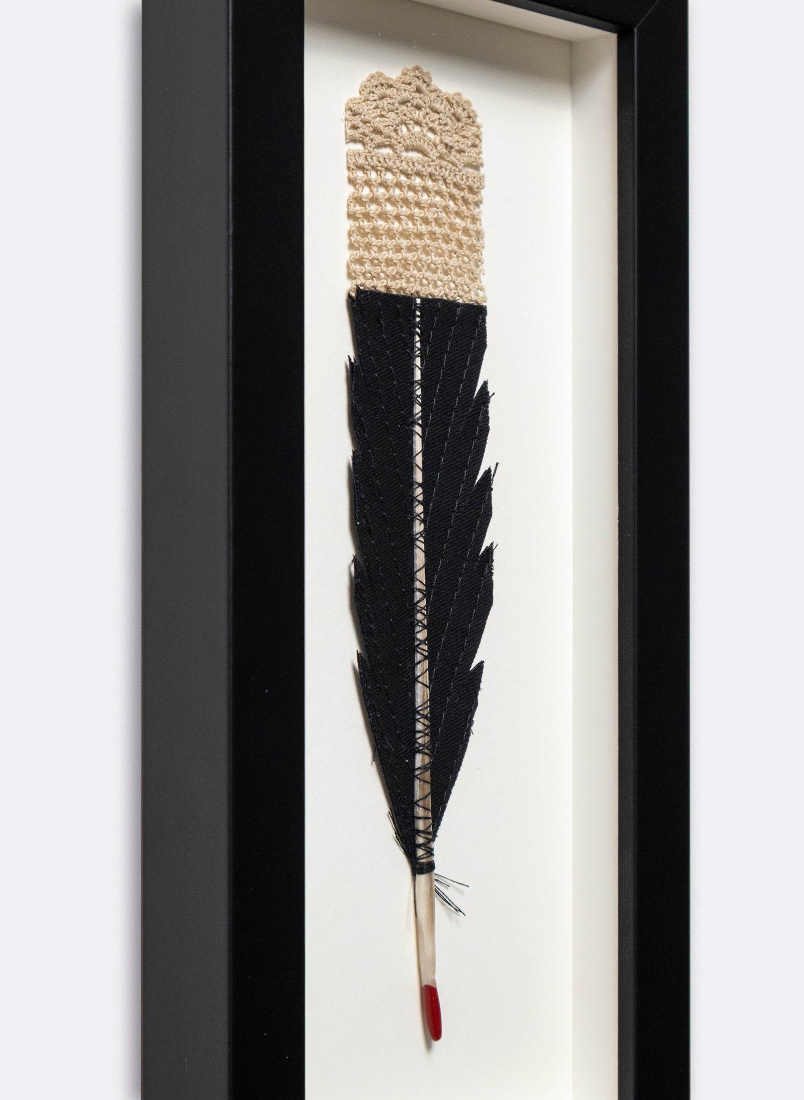 Single Huia Feather Framed