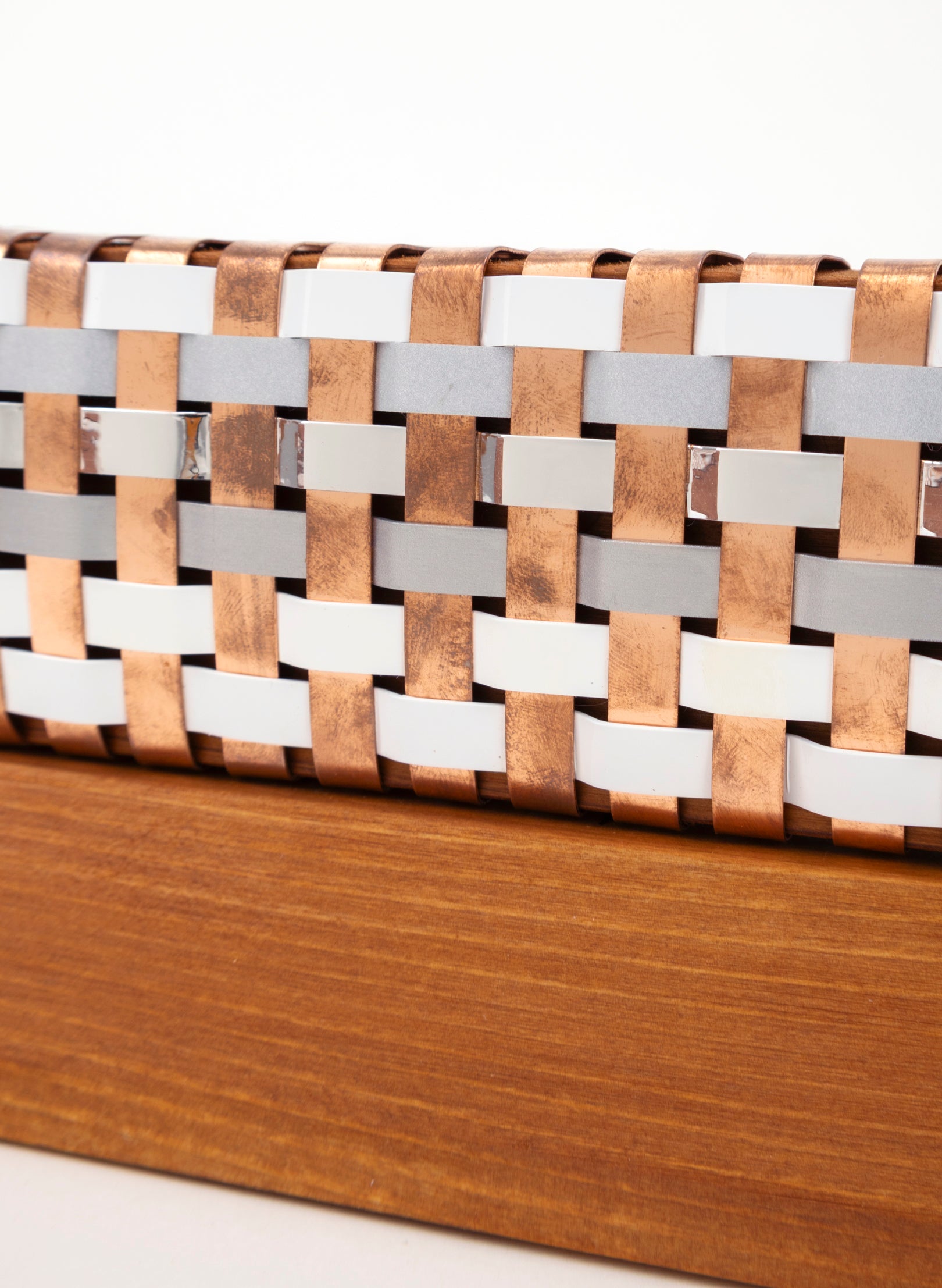 White, Silver and Copper Waka on Plinth