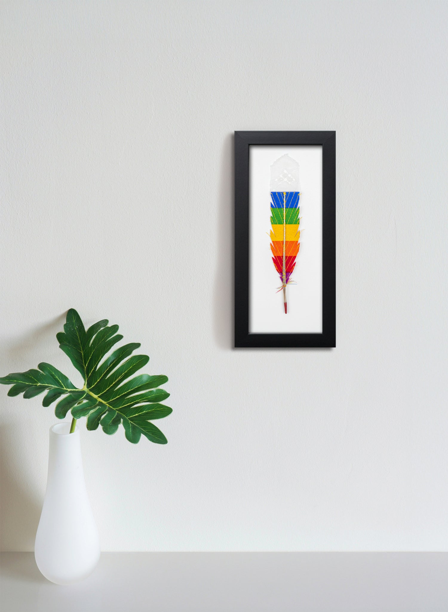 Single Huia Feather Framed