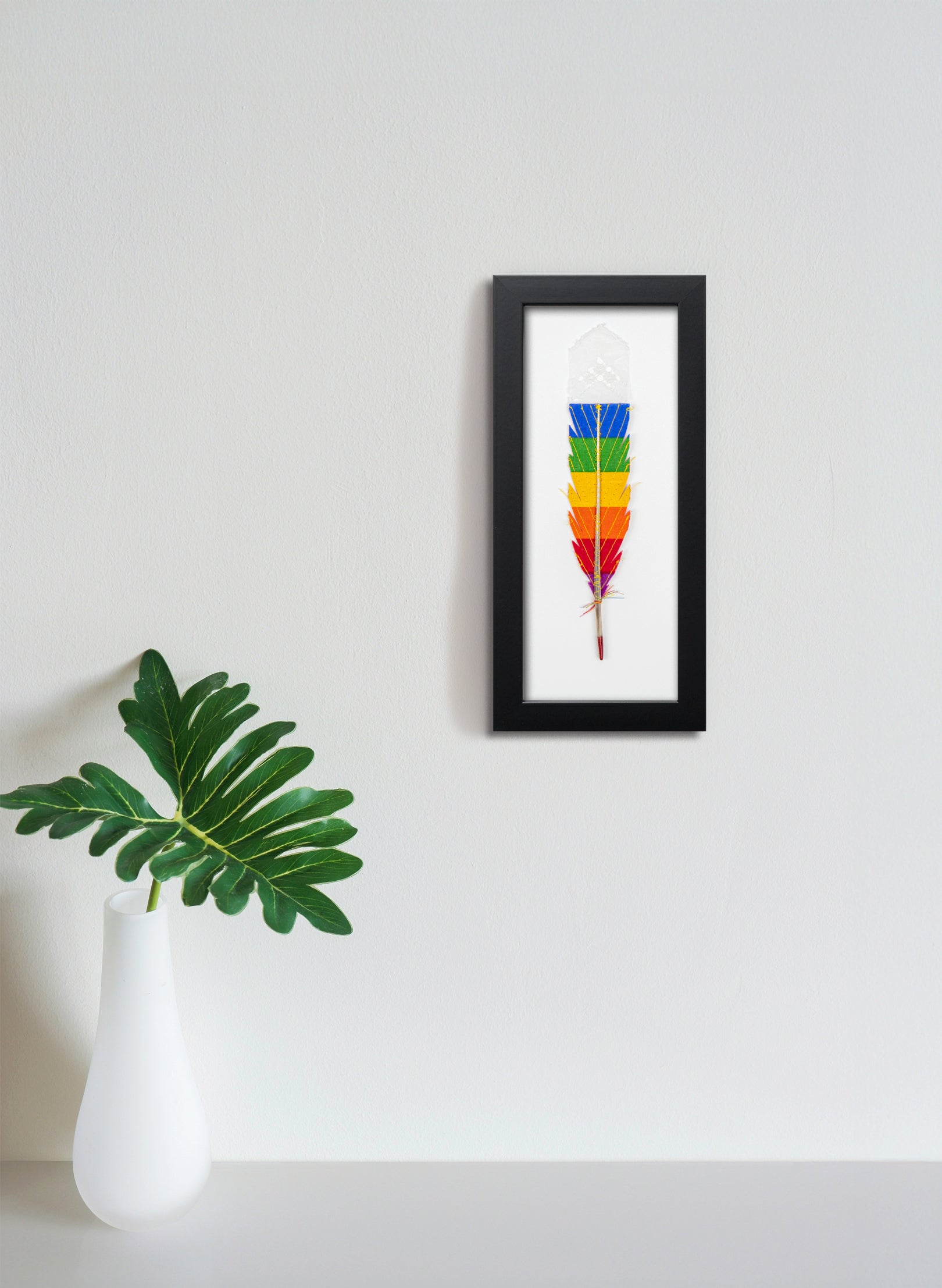 Single Huia Feather Framed