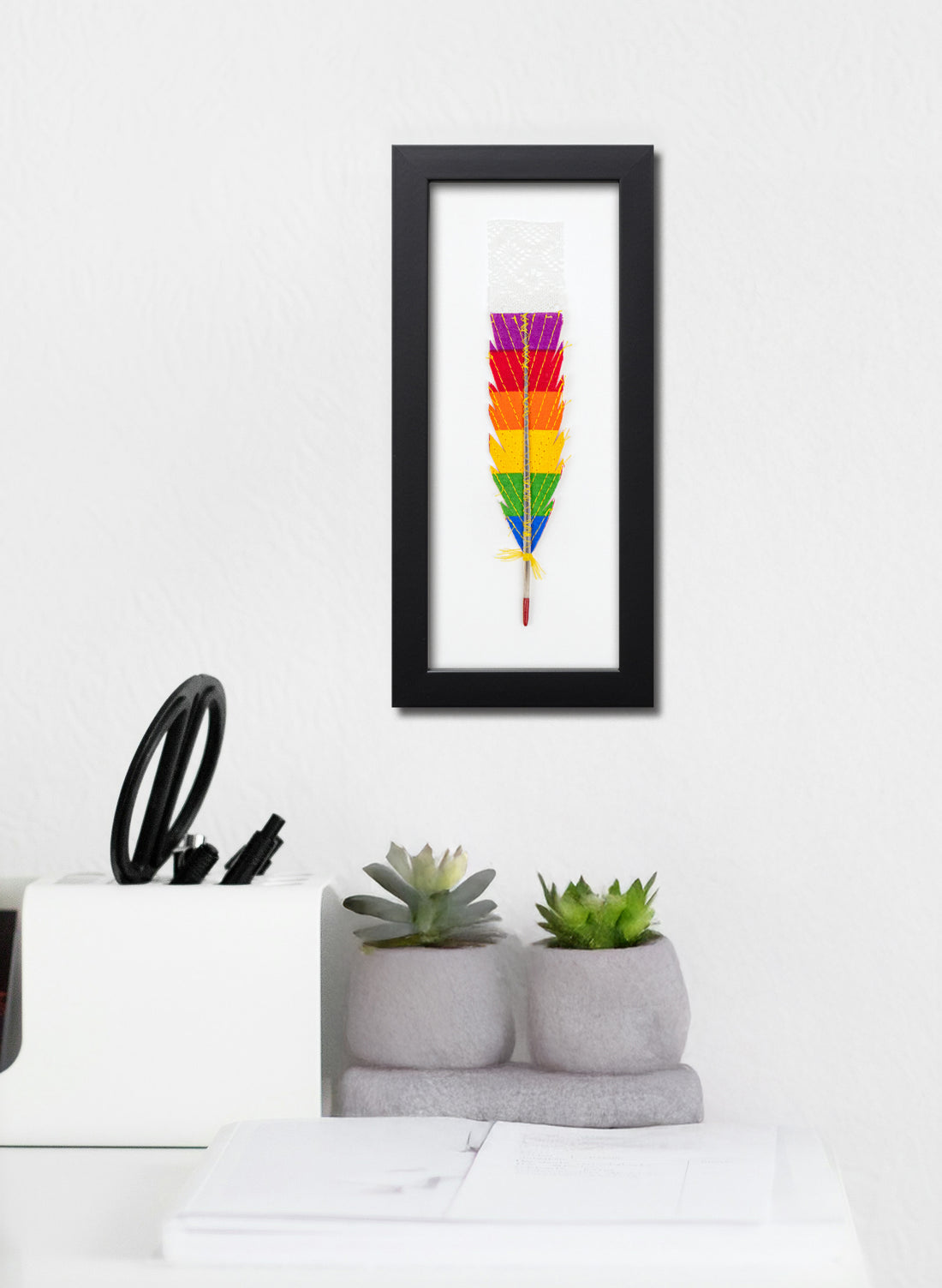 Single Huia Feather Framed