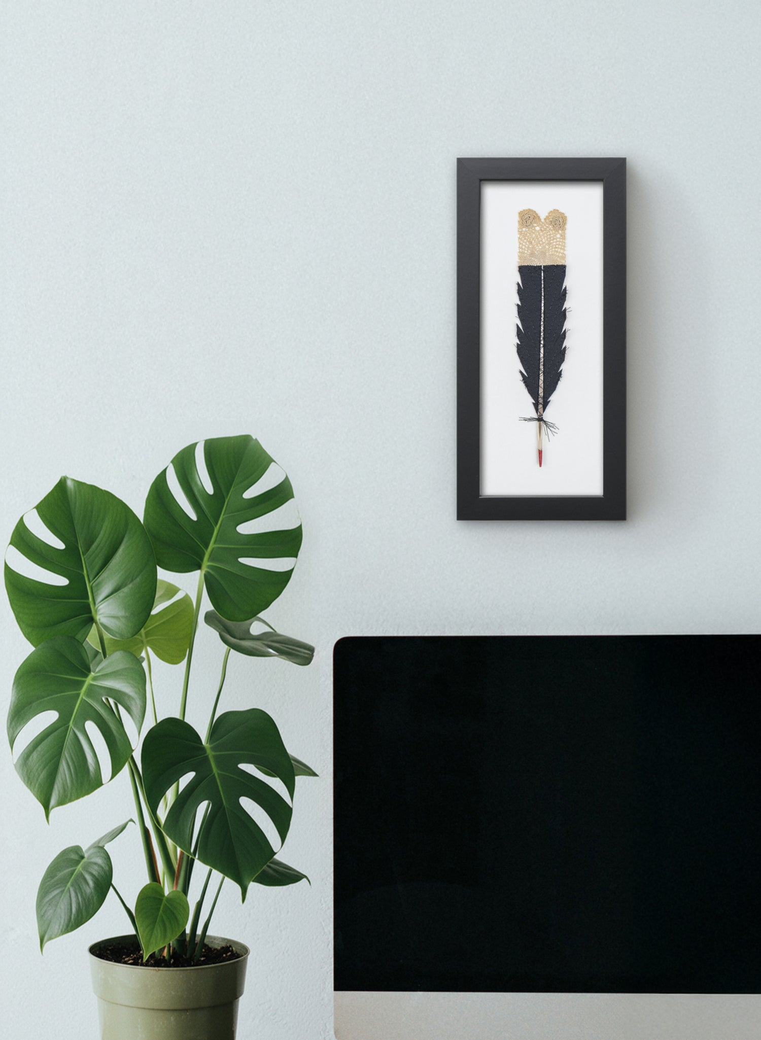 Single Huia Feather Framed