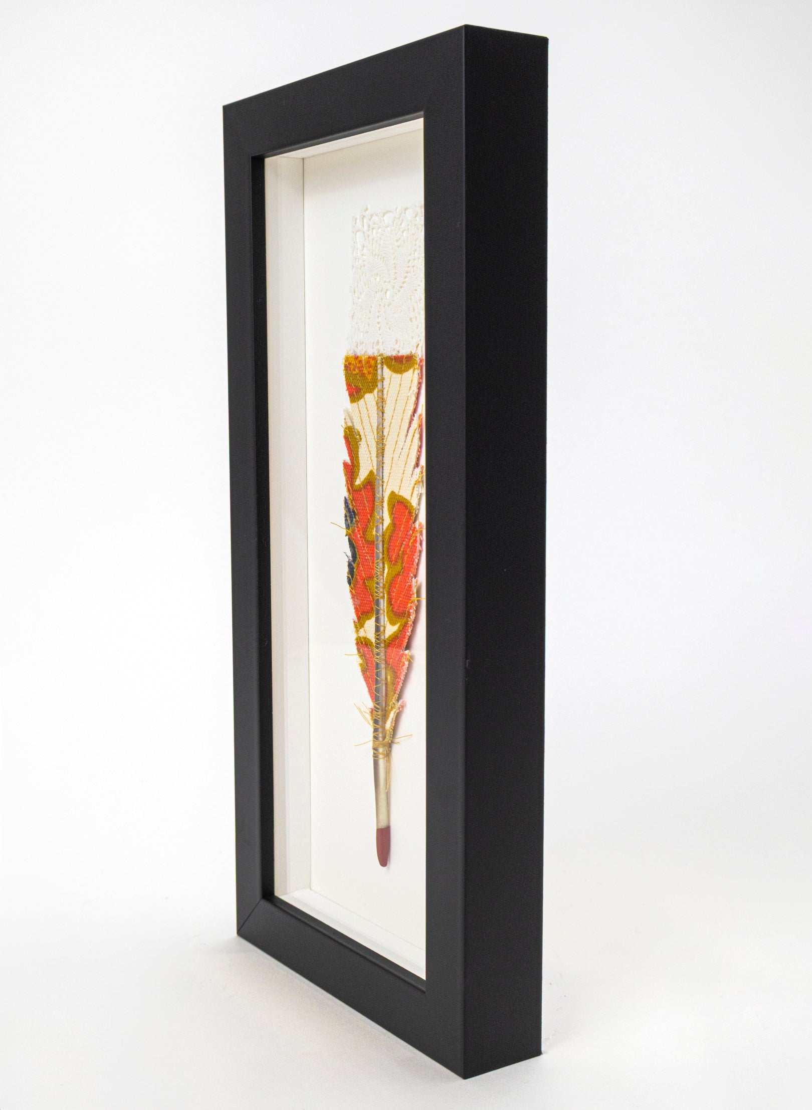 Single Huia Feather Framed