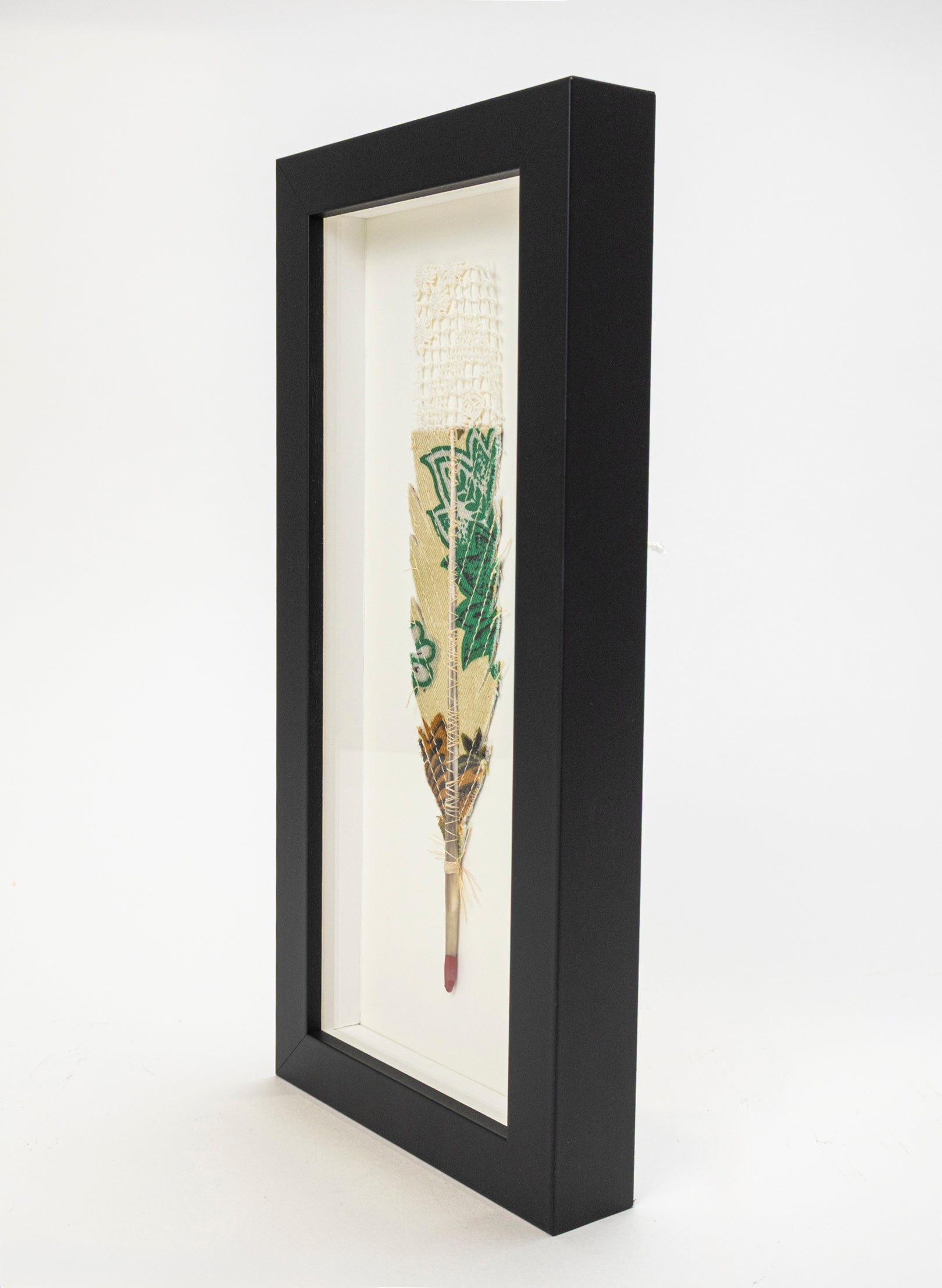 Single Huia Feather Framed