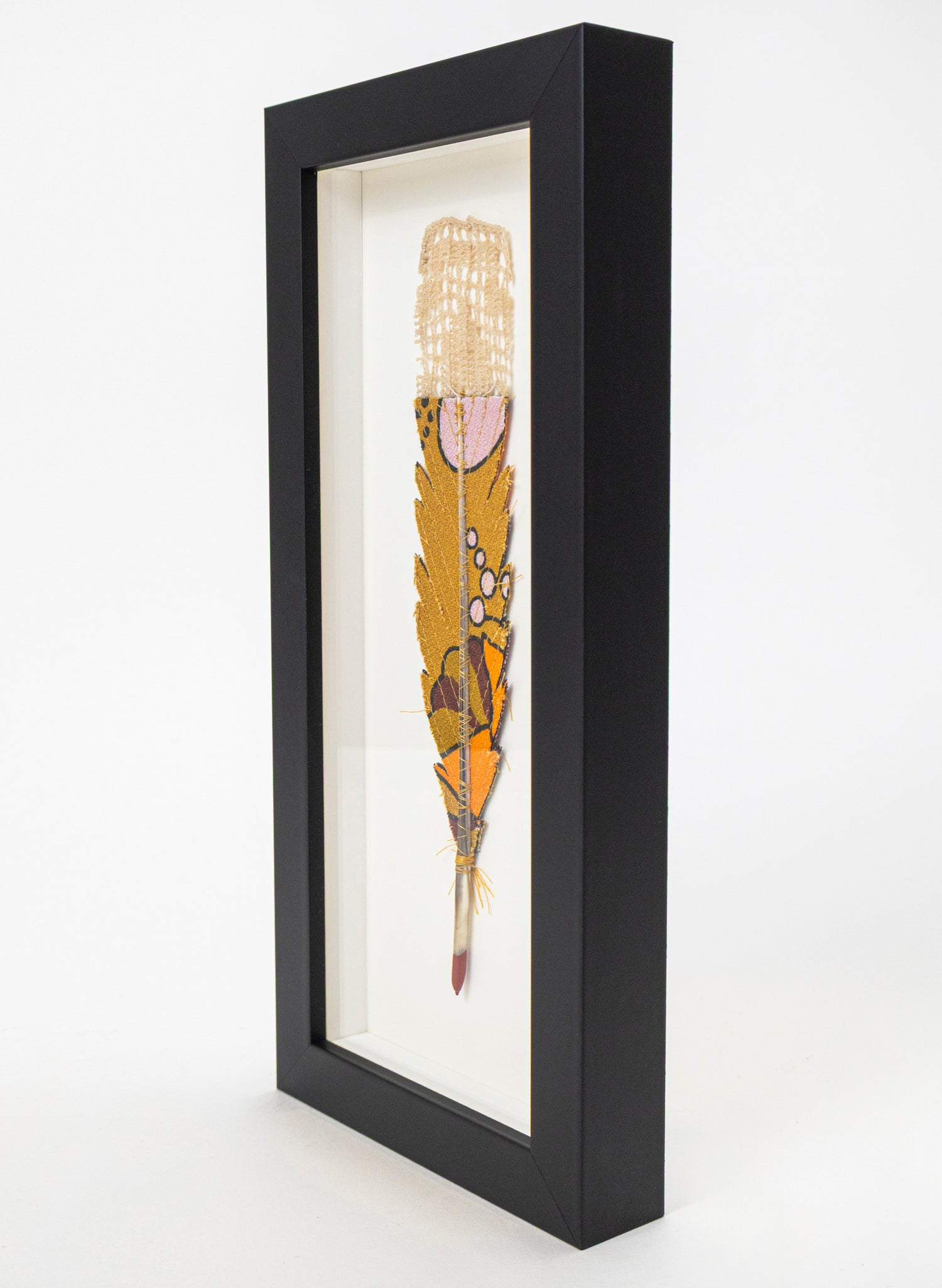 Single Huia Feather Framed