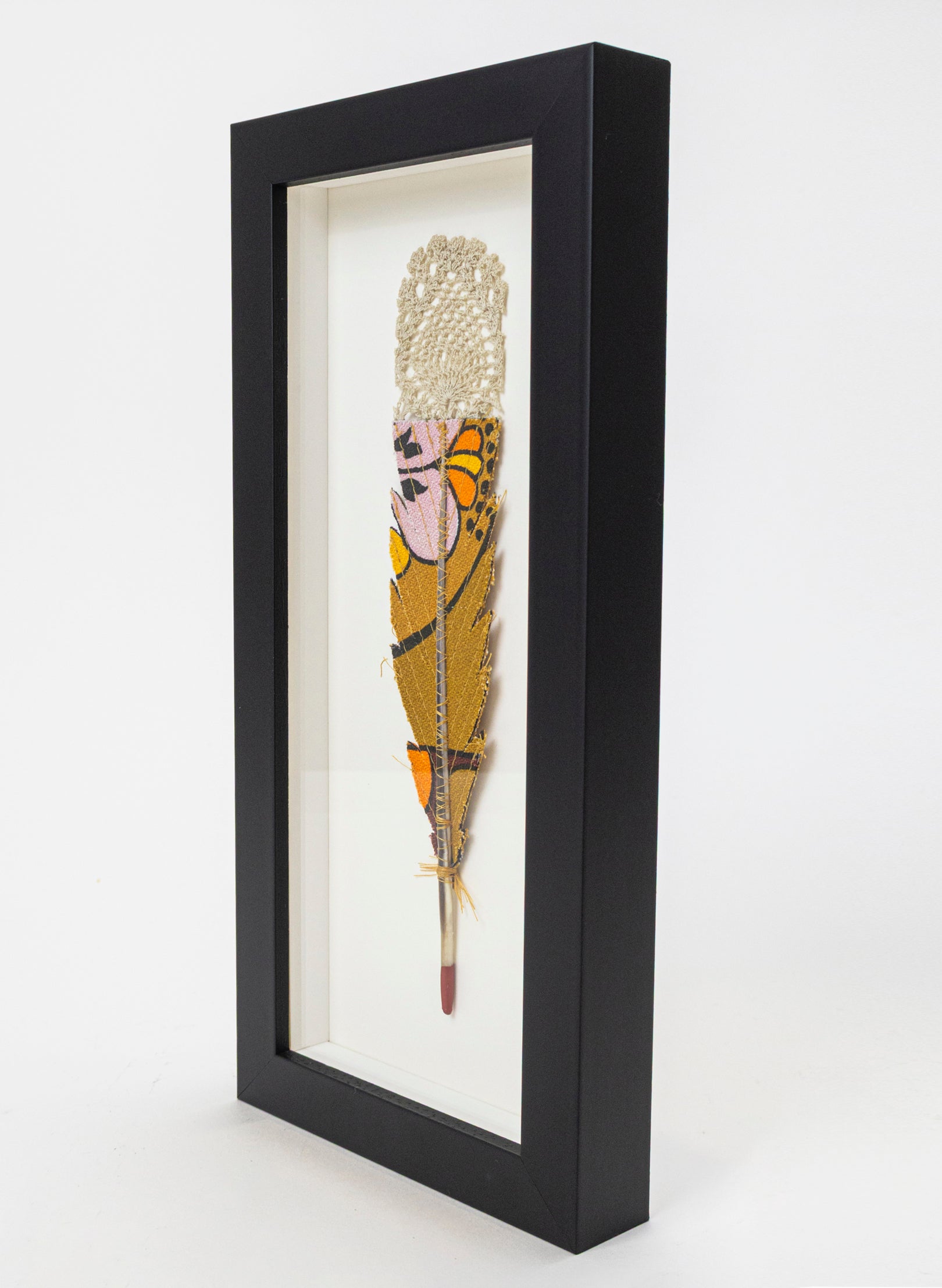 Single Huia Feather Framed