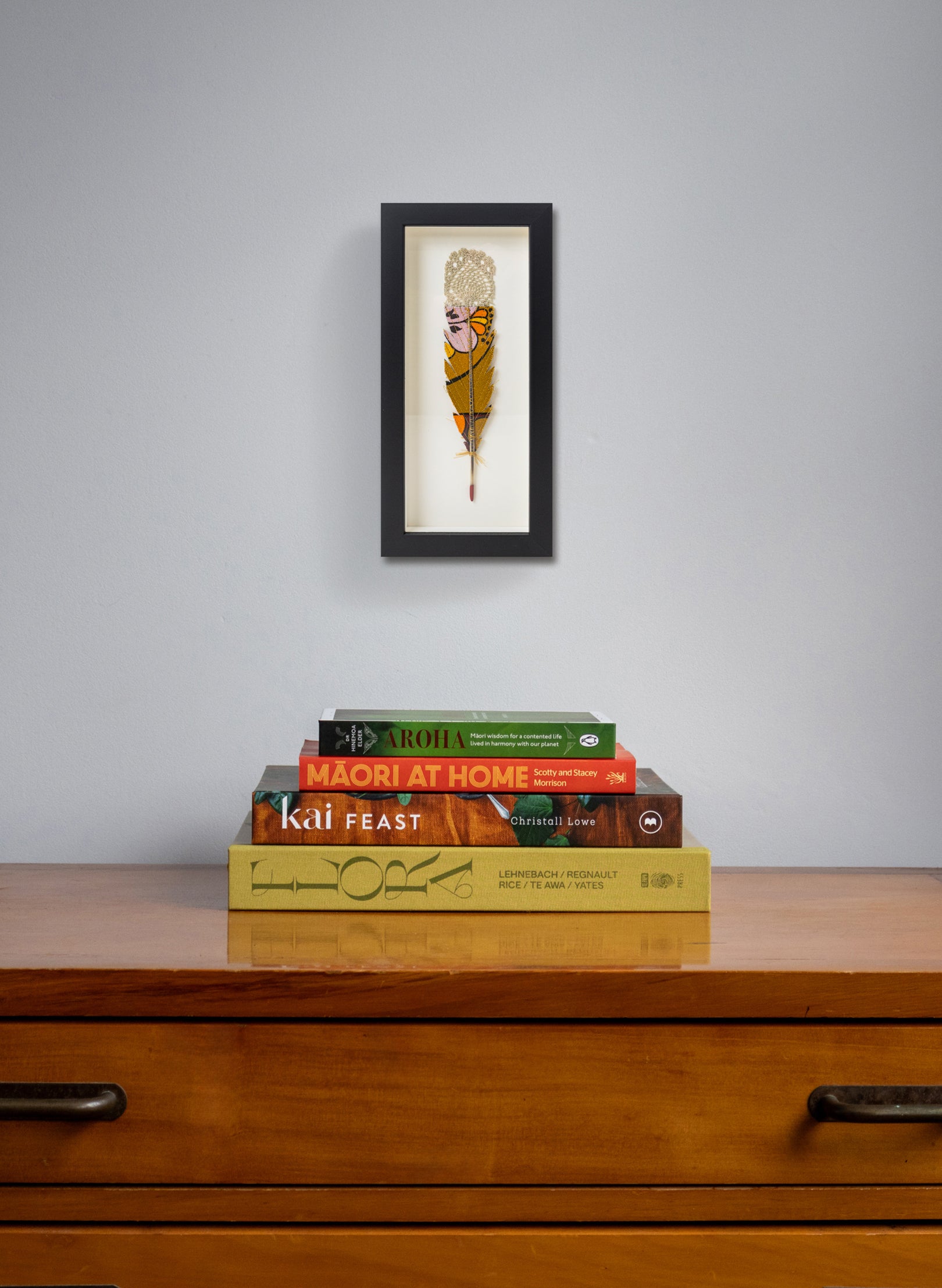 Single Huia Feather Framed