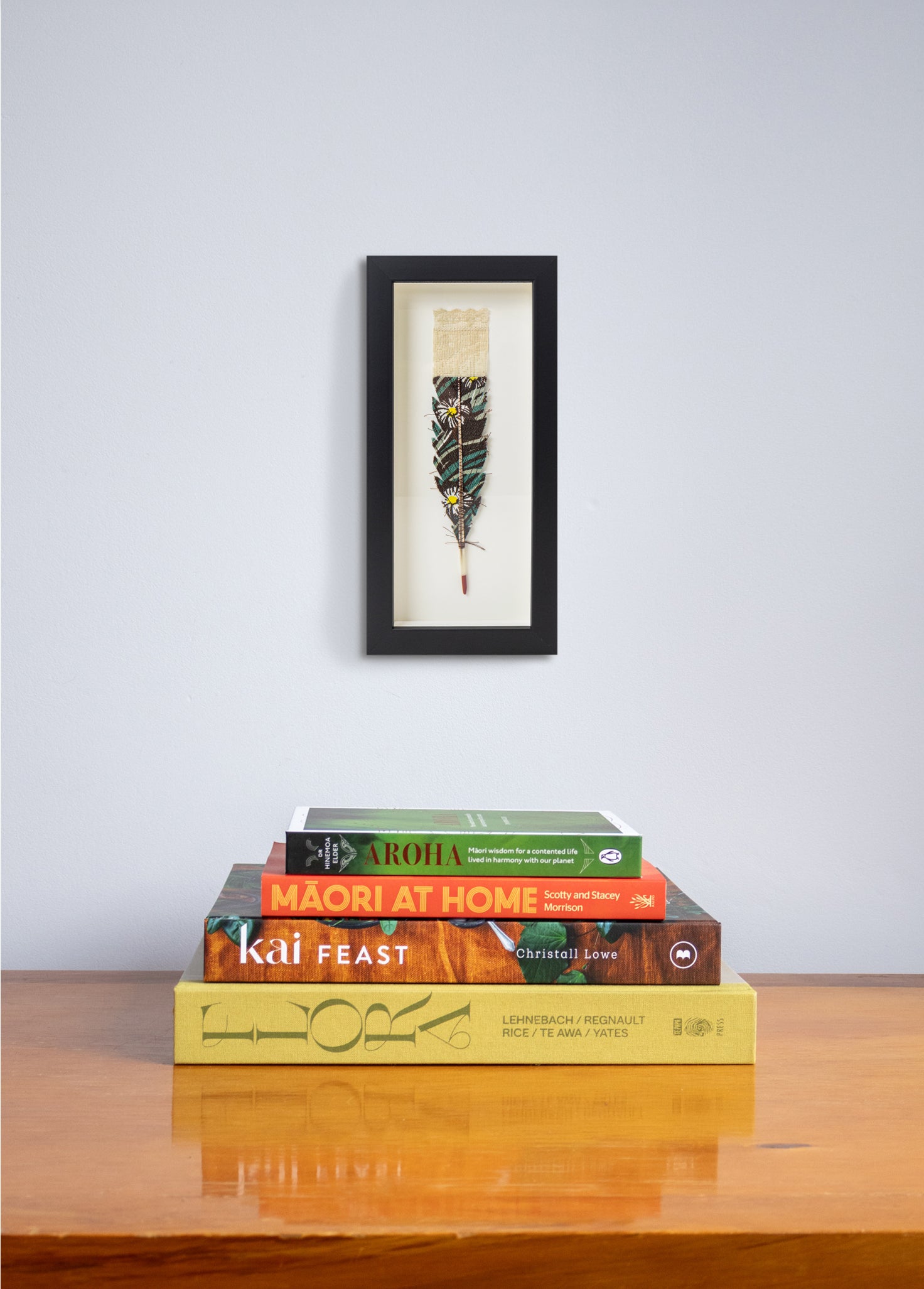 Single Huia Feather Framed