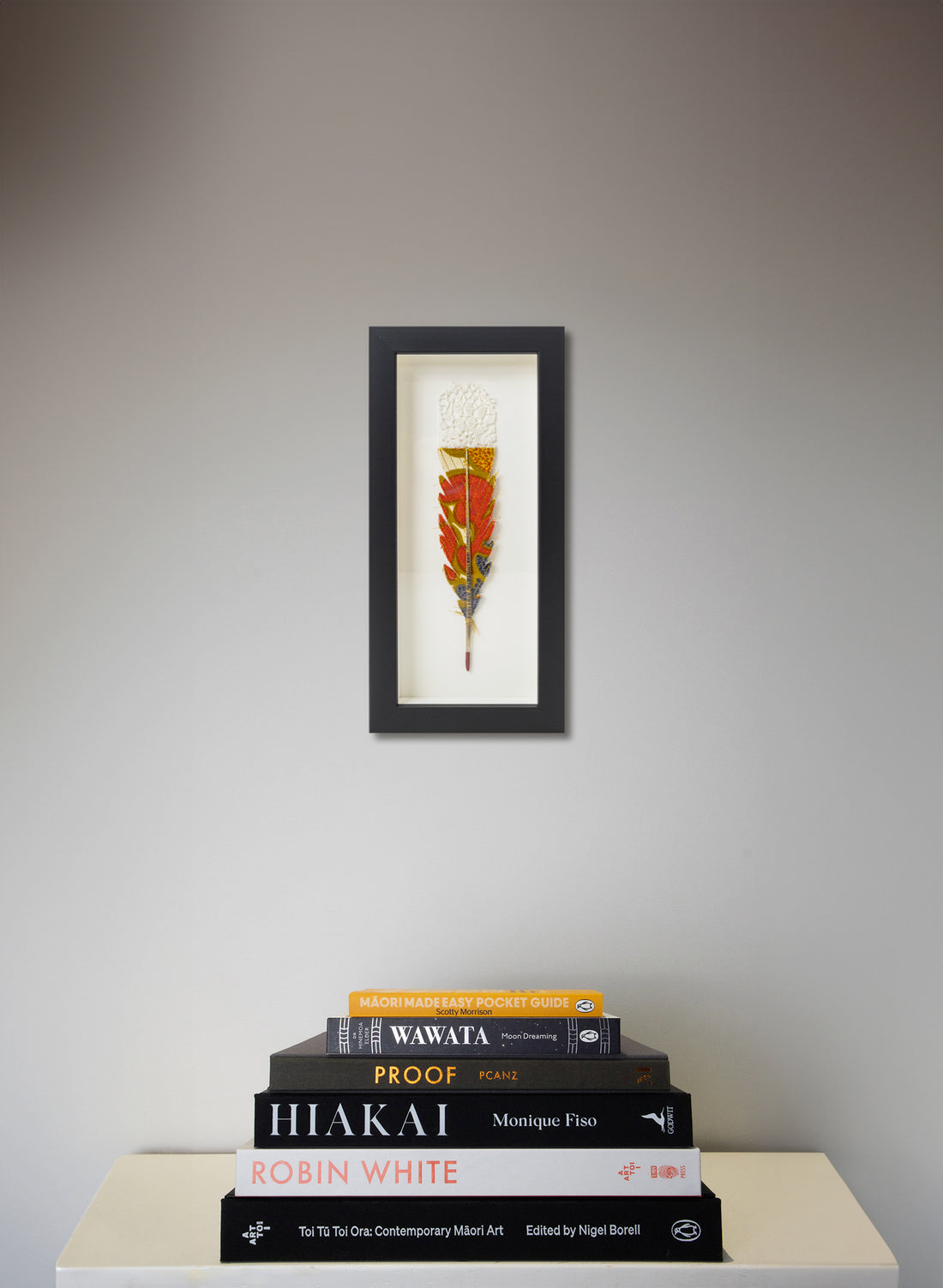 Single Huia Feather Framed