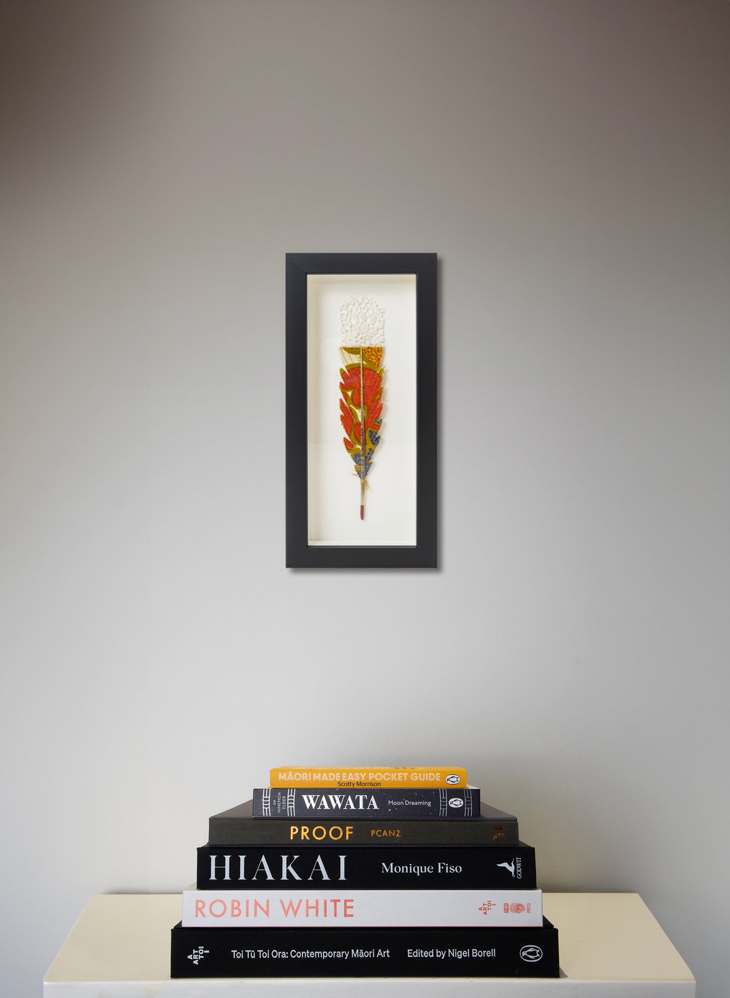 Single Huia Feather Framed