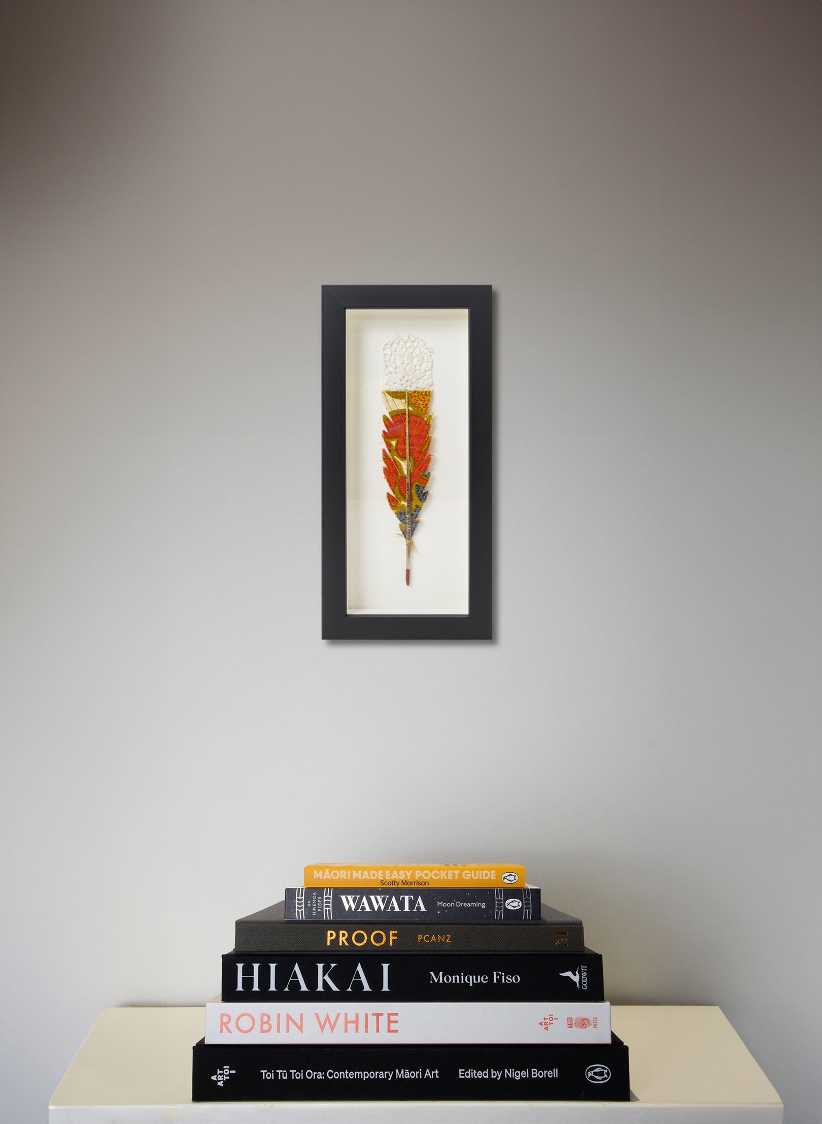 Single Huia Feather Framed