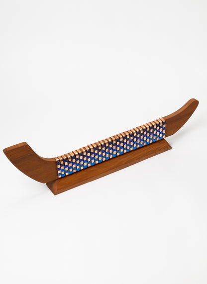 Blues and Copper Waka on Plinth