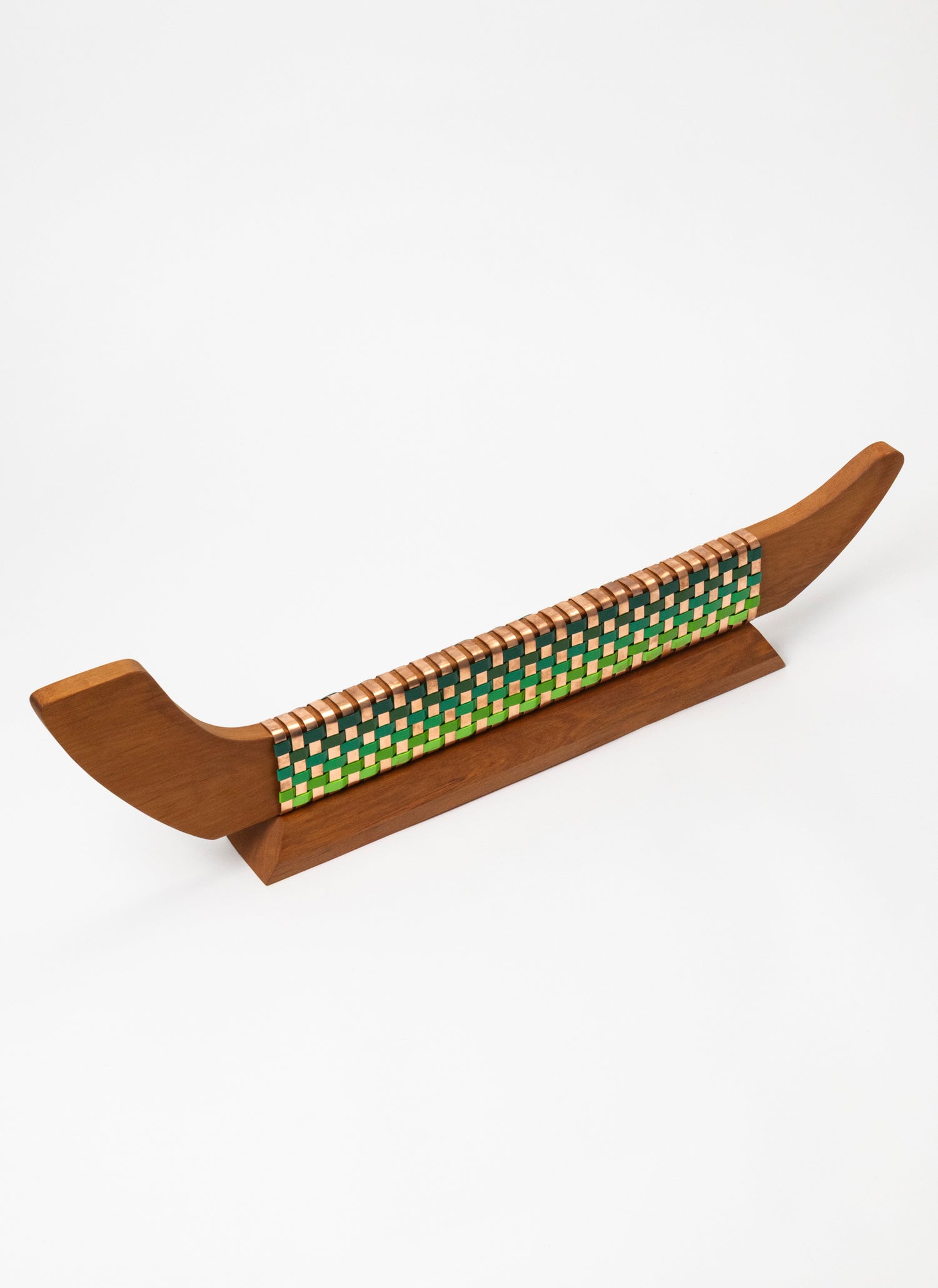 Greens and Copper Waka on Plinth
