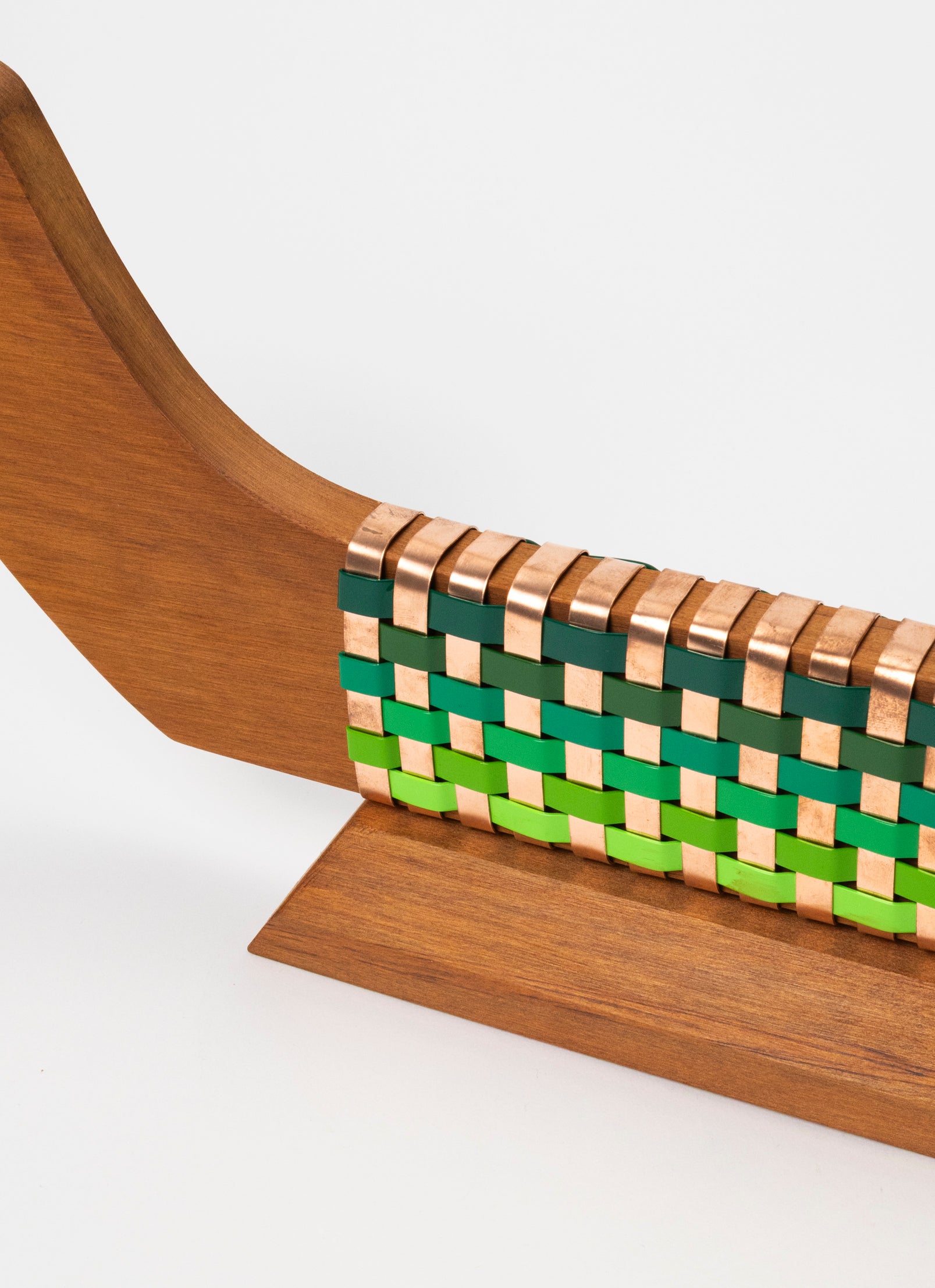 Greens and Copper Waka on Plinth