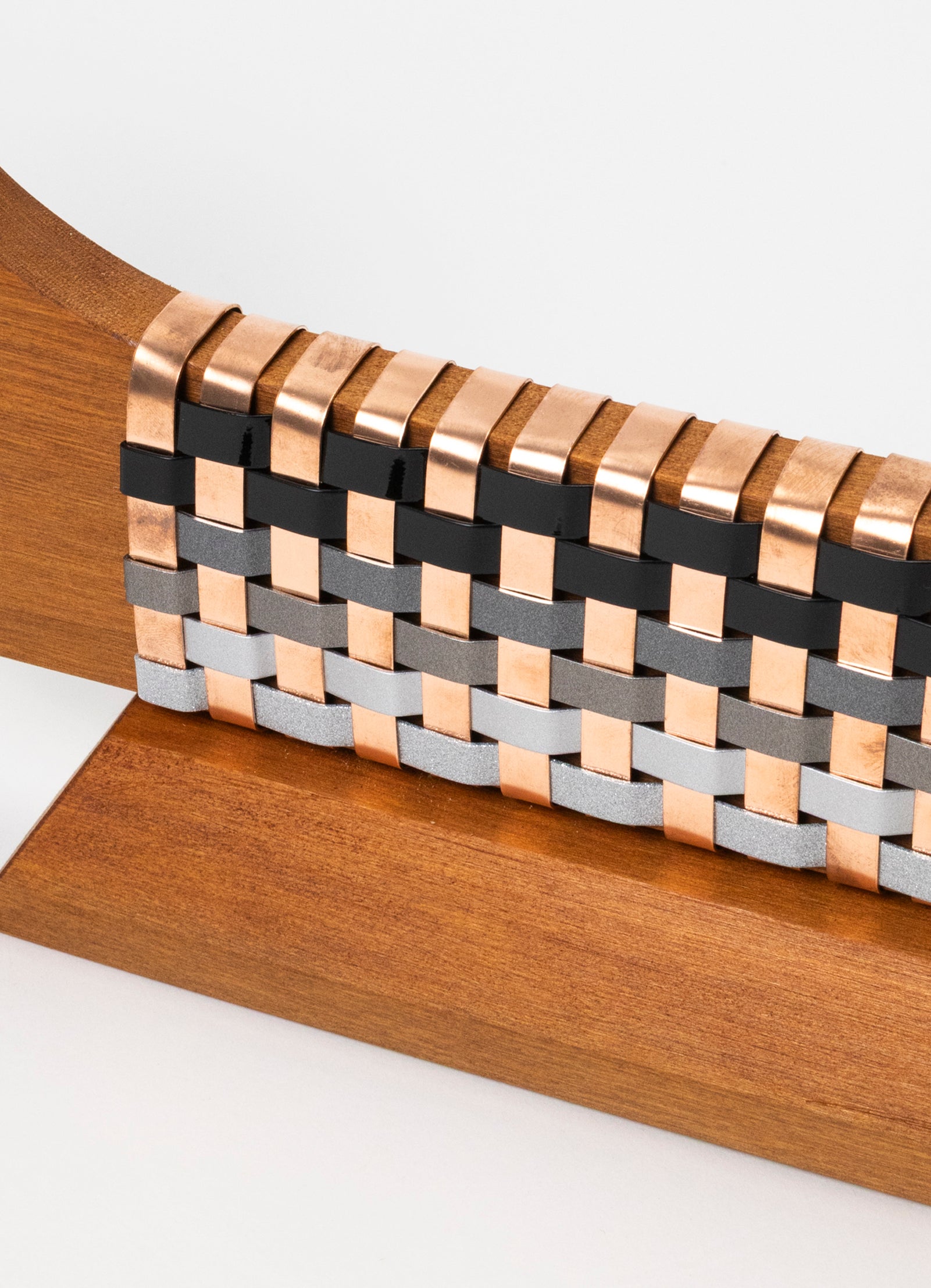 Black, Silver and Copper Waka on Plinth