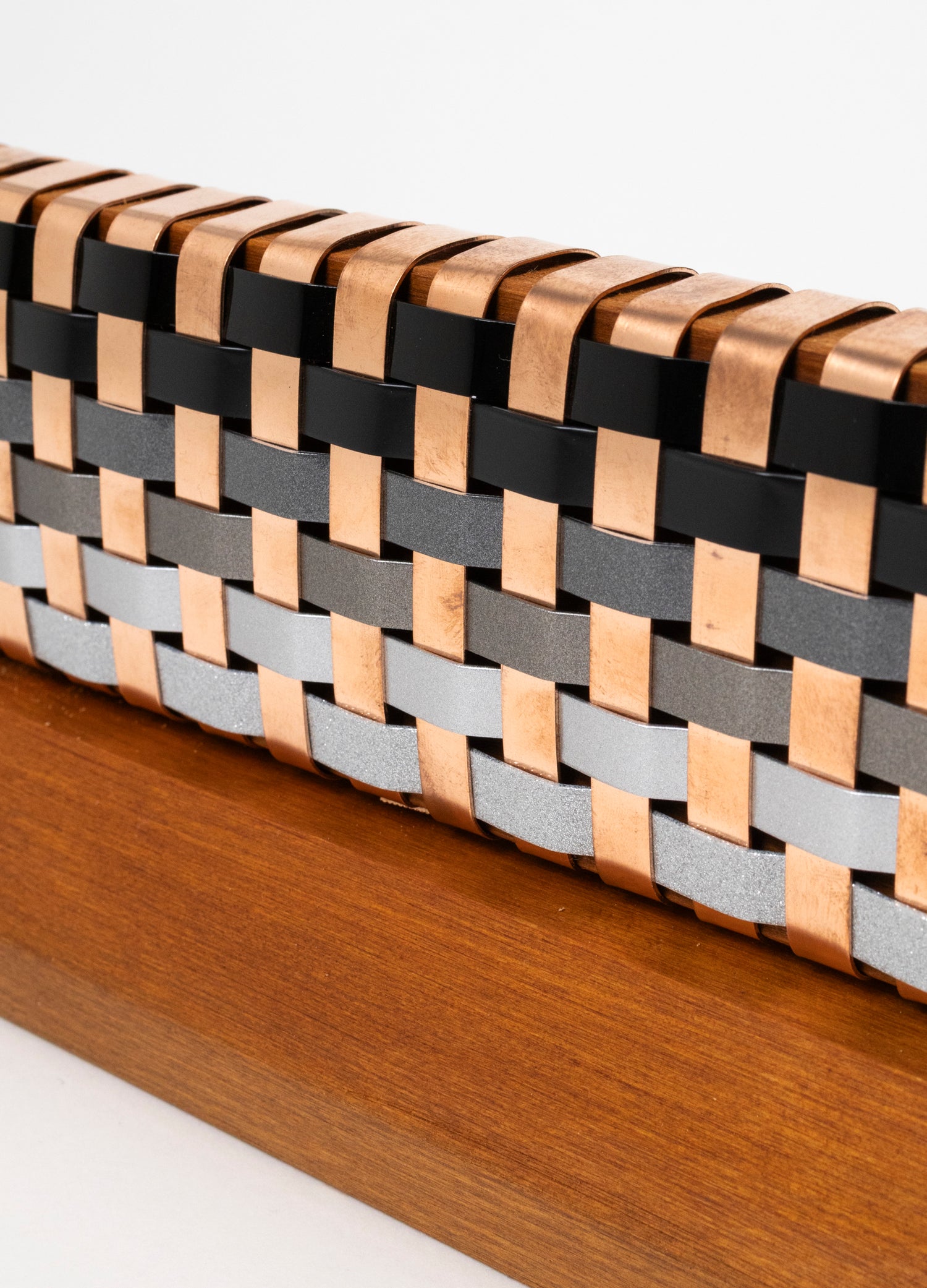 Black, Silver and Copper Waka on Plinth