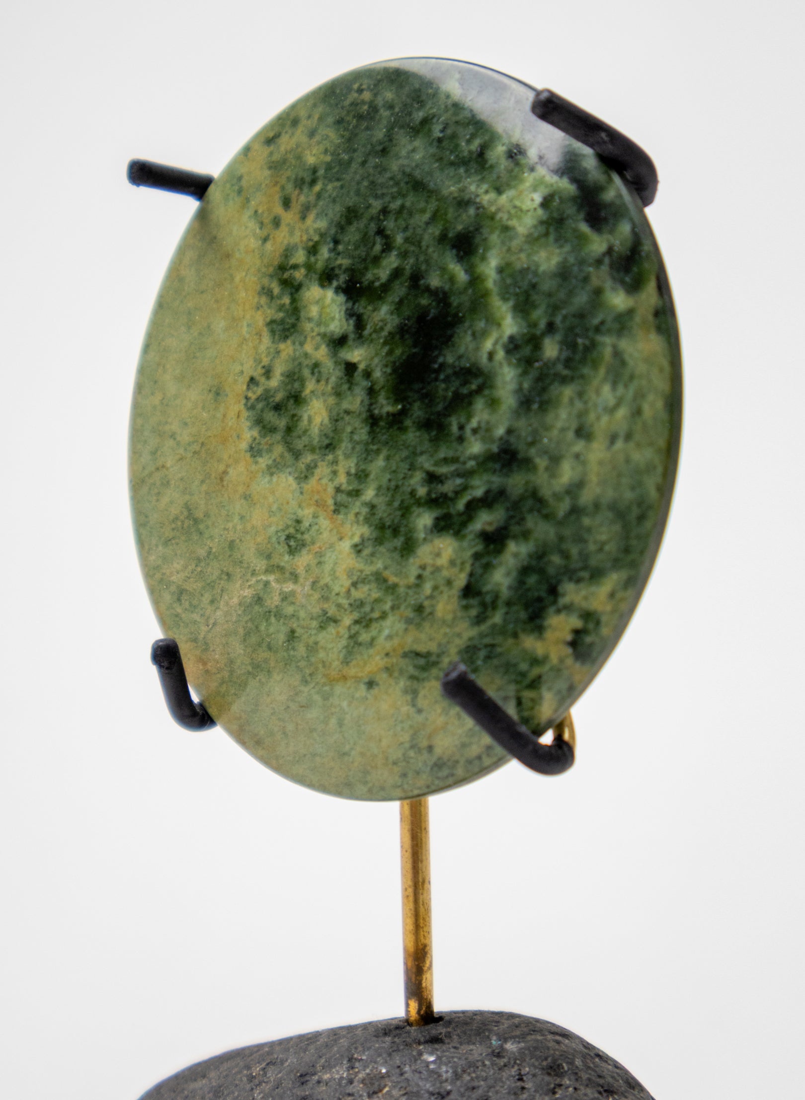 Pounamu Disc on Stand