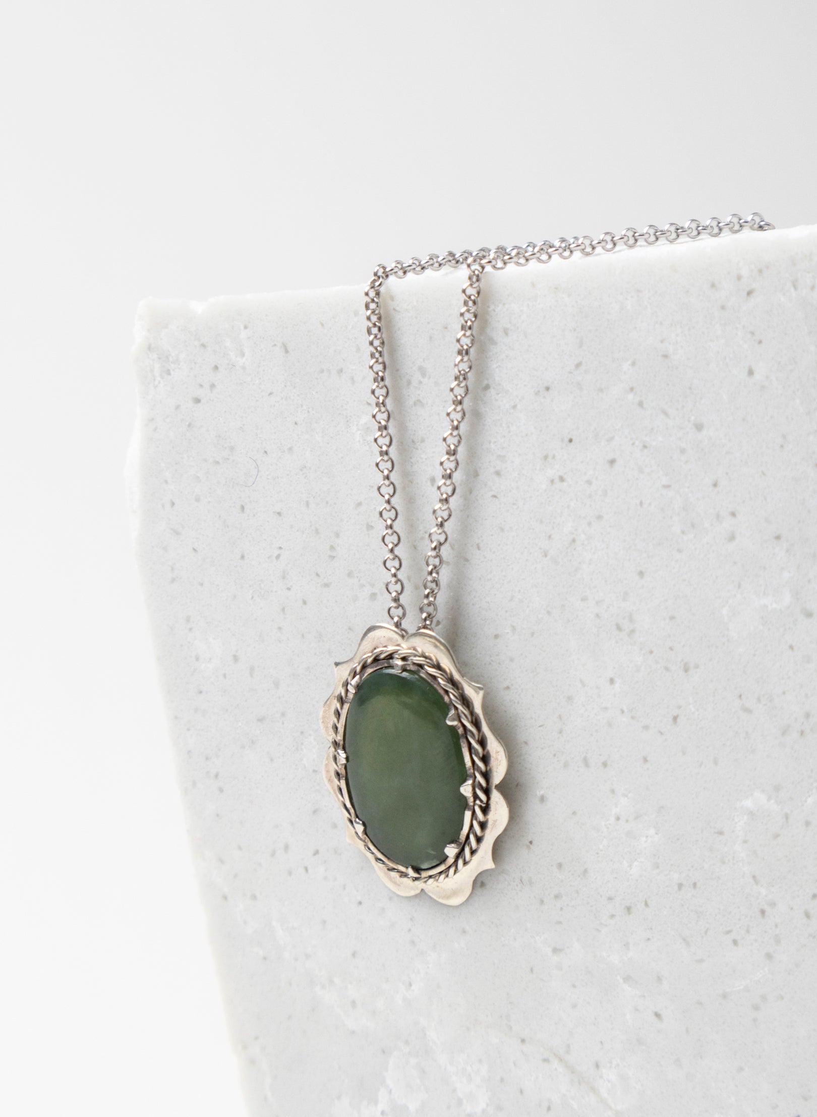 Hei Kaki Silver and Pounamu Pendant