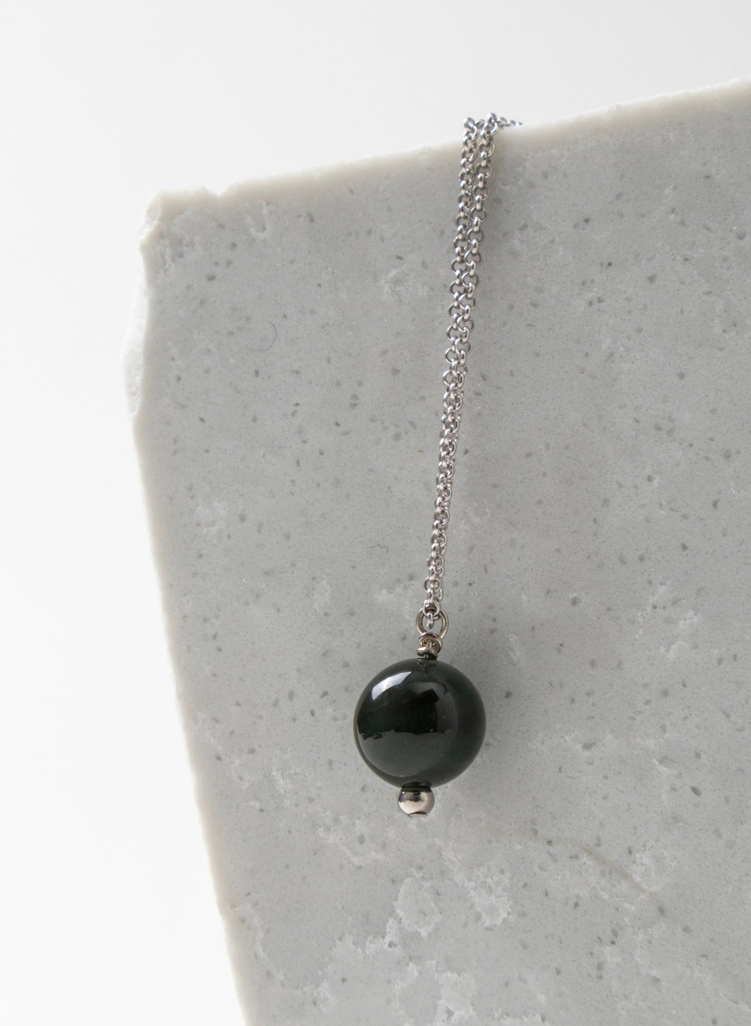 Hei Kaki Silver and Pounamu Pendant