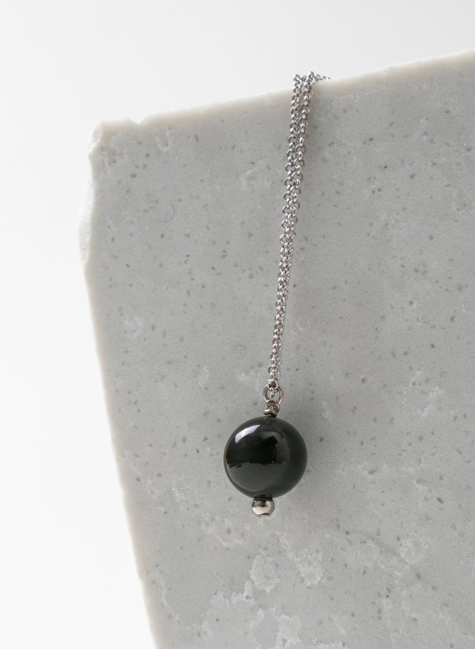 Hei Kaki Silver and Pounamu Pendant