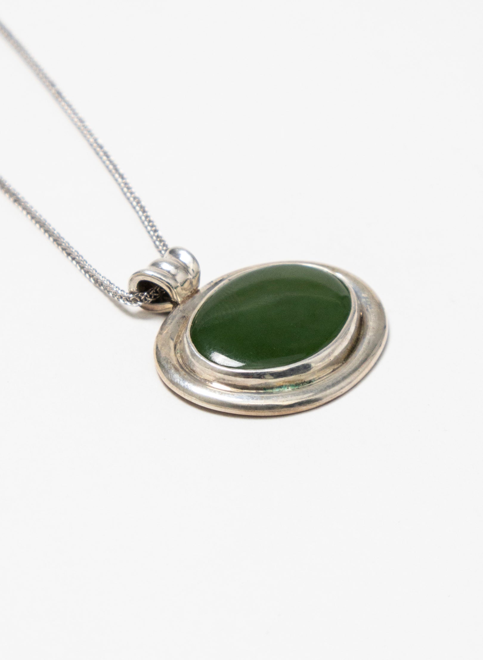 Hei Kaki Silver and Pounamu Pendant