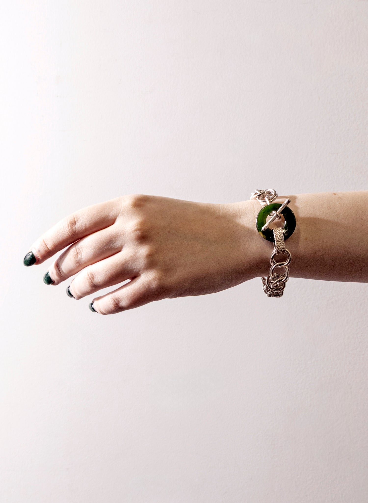 Pounamu Porowhita Disc on a Silver 2 Ring Chainmail Bracelet
