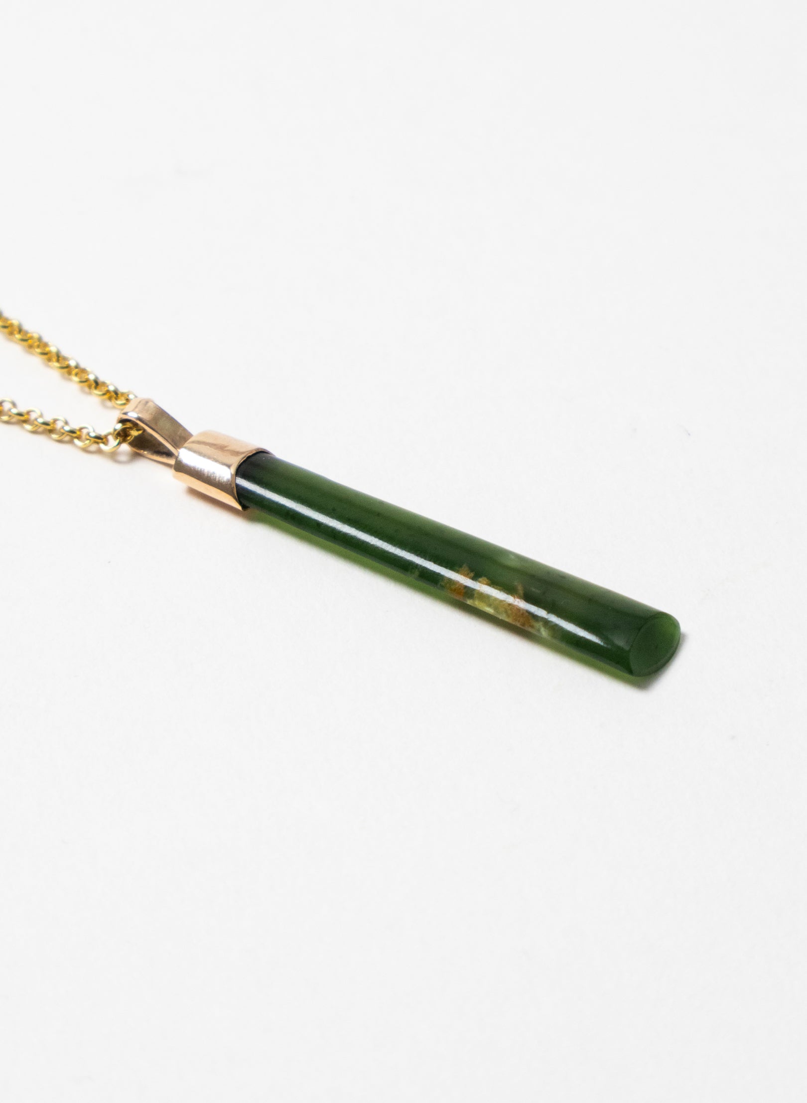Small Pounamu Hei Toki on a Gold Chain