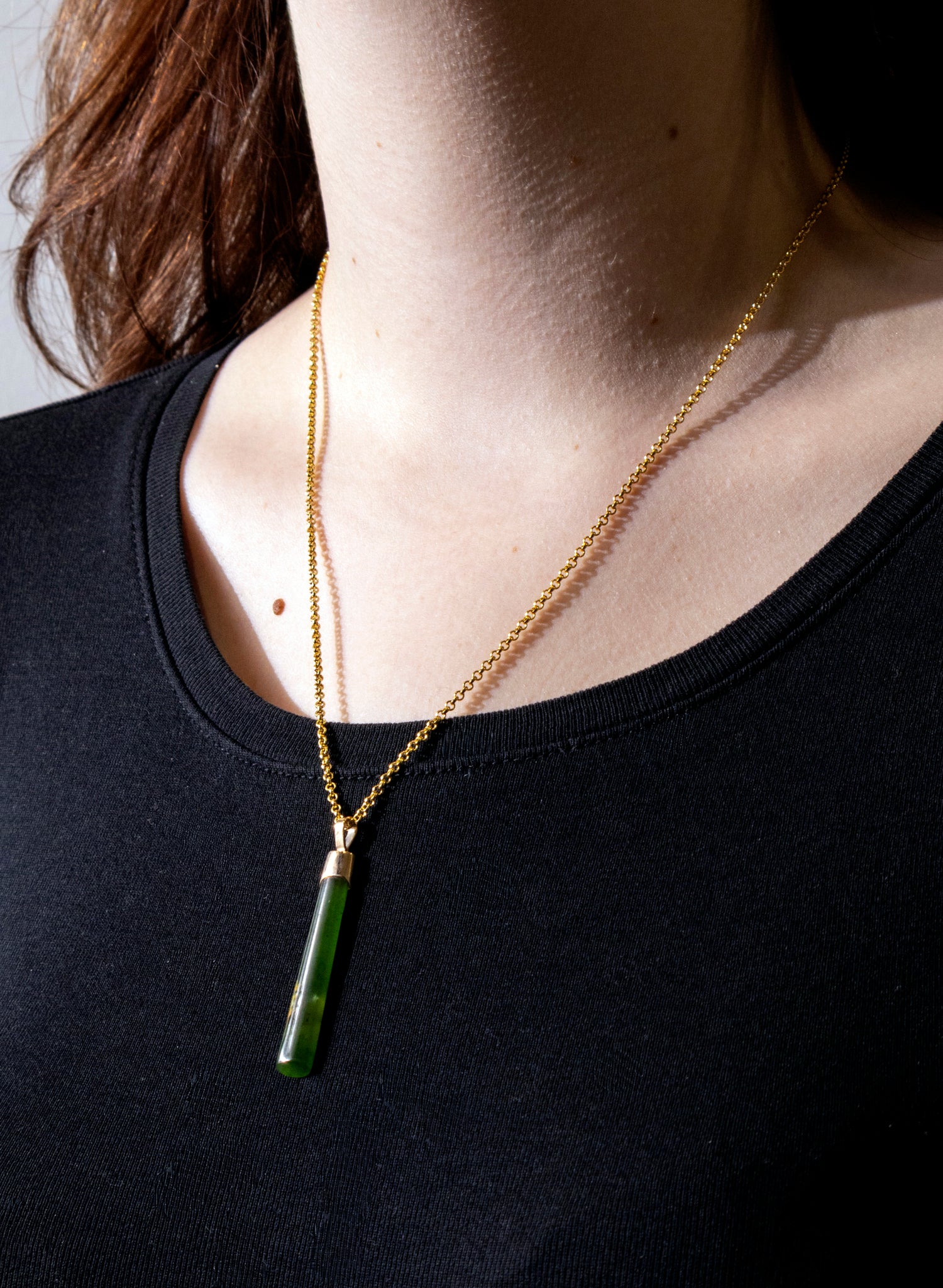 Small Pounamu Hei Toki on a Gold Chain