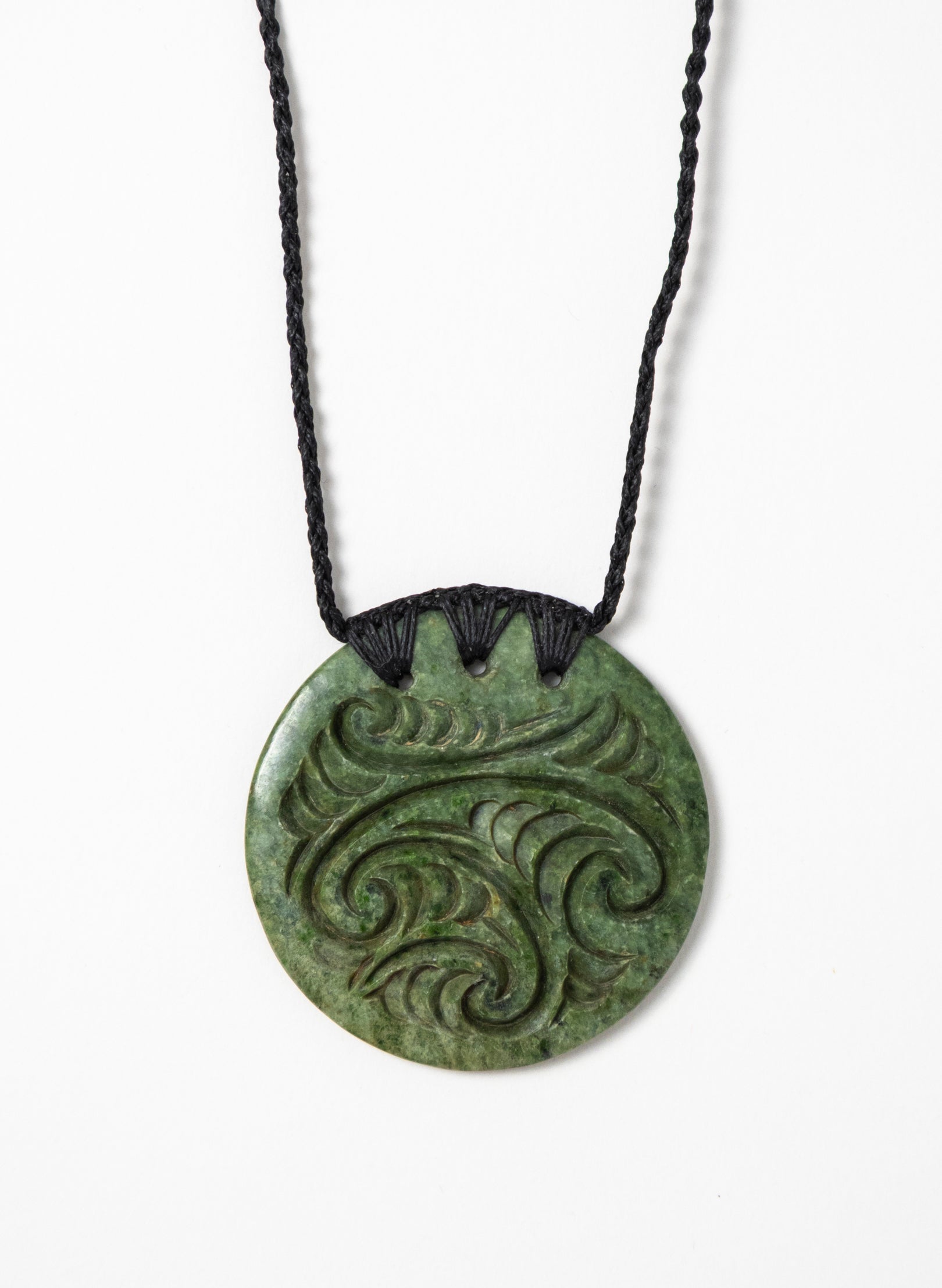 Carved Pounamu Porowhita Disc