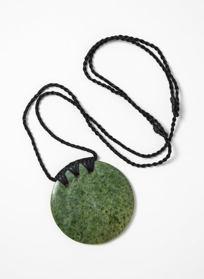 Carved Pounamu Porowhita Disc