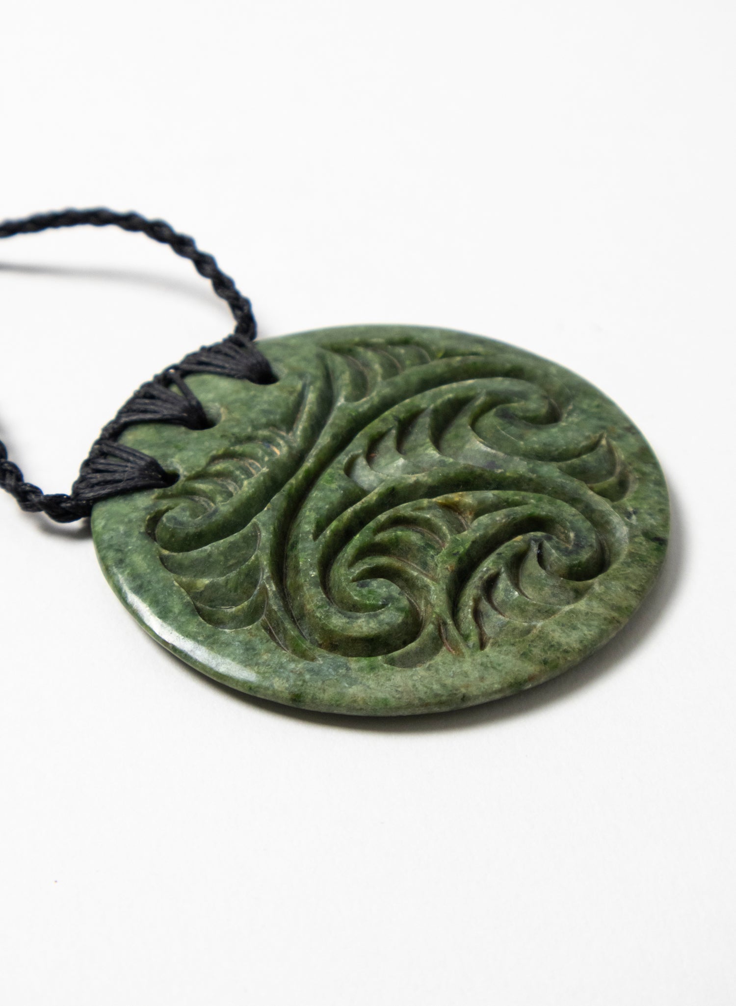 Carved Pounamu Porowhita Disc